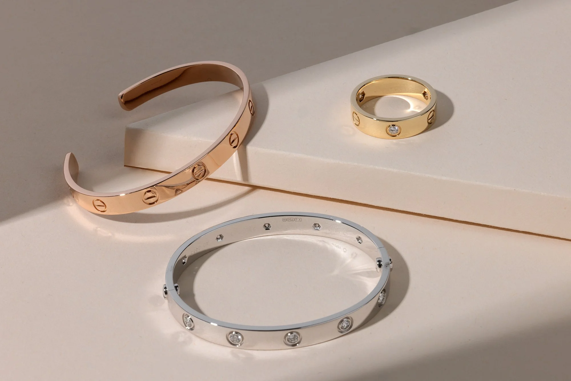 Bracciali e anello Cartier Love in oro e acciaio