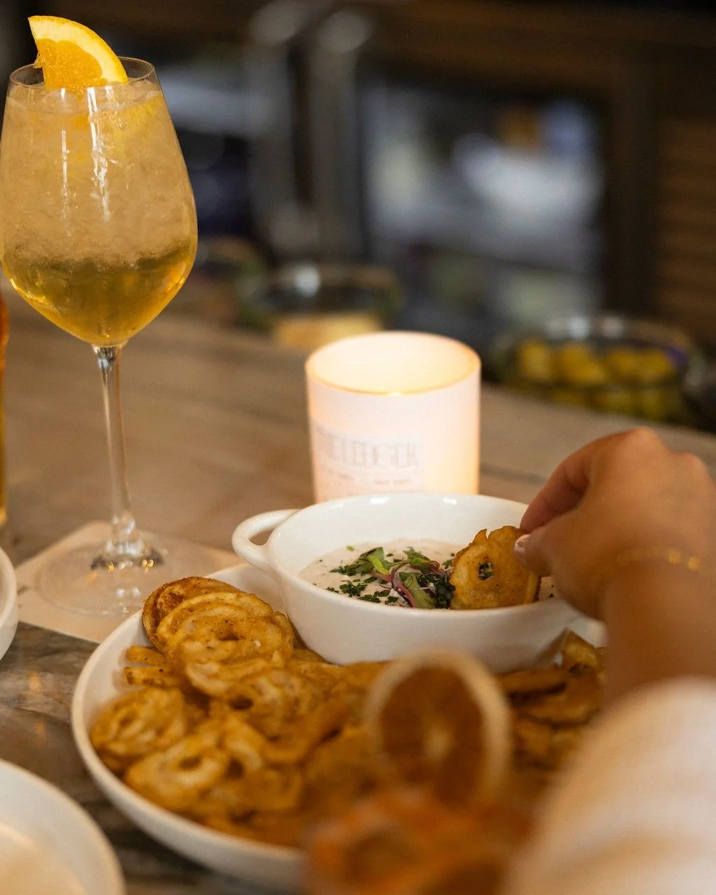 Your table is set for flavor, friendship, and a twist of something unexpected.
 
From smoky pours to sparkling, citrusy refreshers, Banker's Hours deliver the best of The Ledger in every glass. 4-6 Tuesday through Friday.
 
Which cocktail are you sta