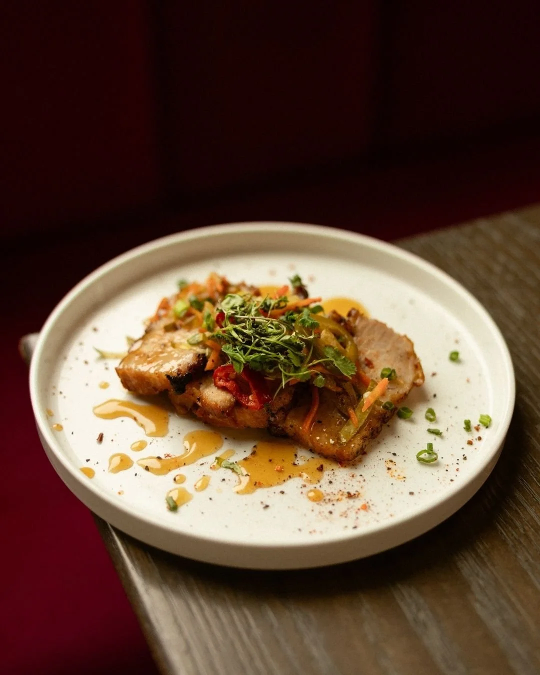 Crispy pork belly with a golden crust and tender, melt-in-your-mouth center ✨

Seasoned with black lime and sriracha spice, then finished with miso maple caramel, pickled vegetables, and black lime salt for the perfect balance of sweet and savory.

R