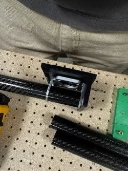 Close up of the motor mount rings and motor mount on the epoxy jig. 