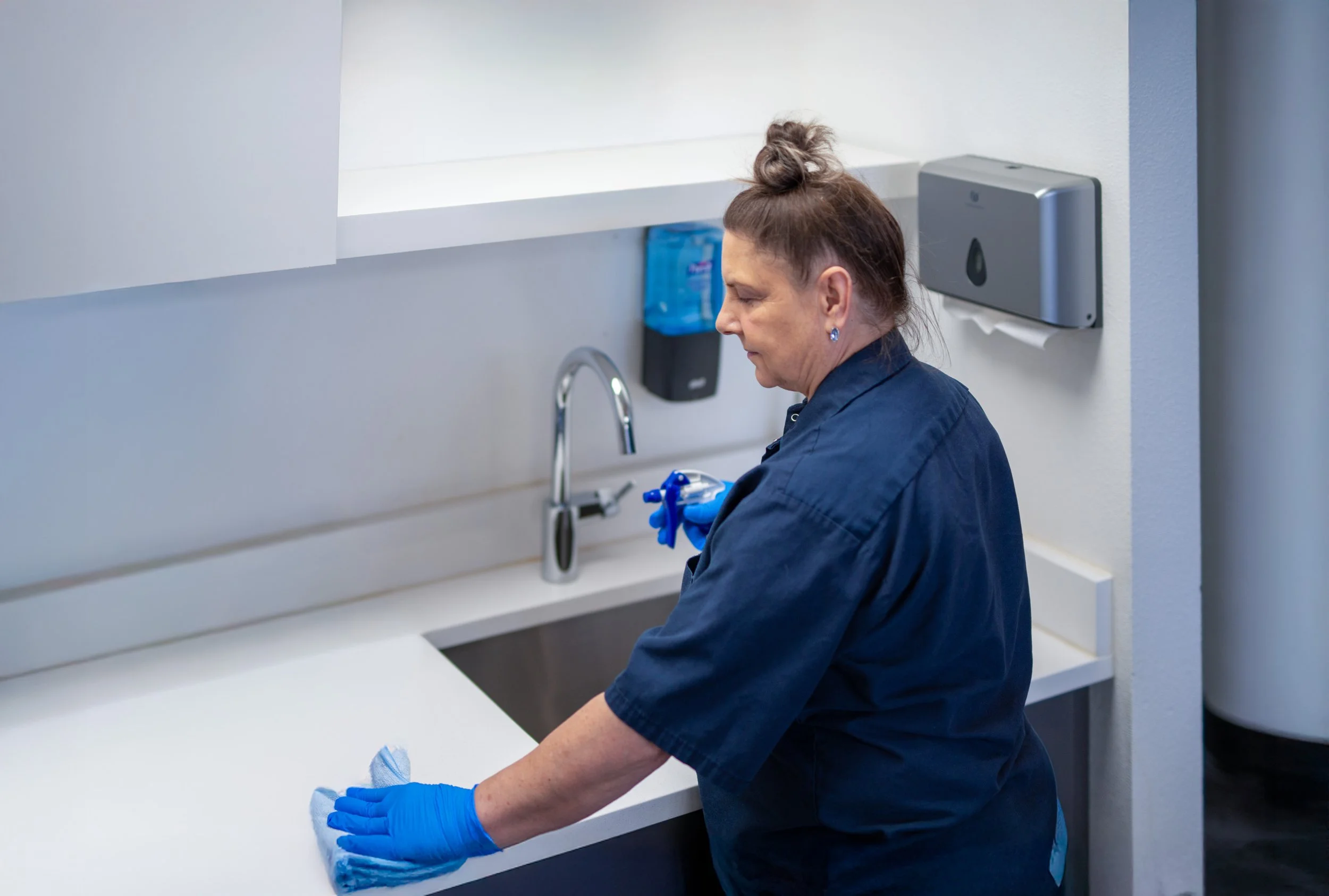 Northwest Success janitor cleaning office kitchen