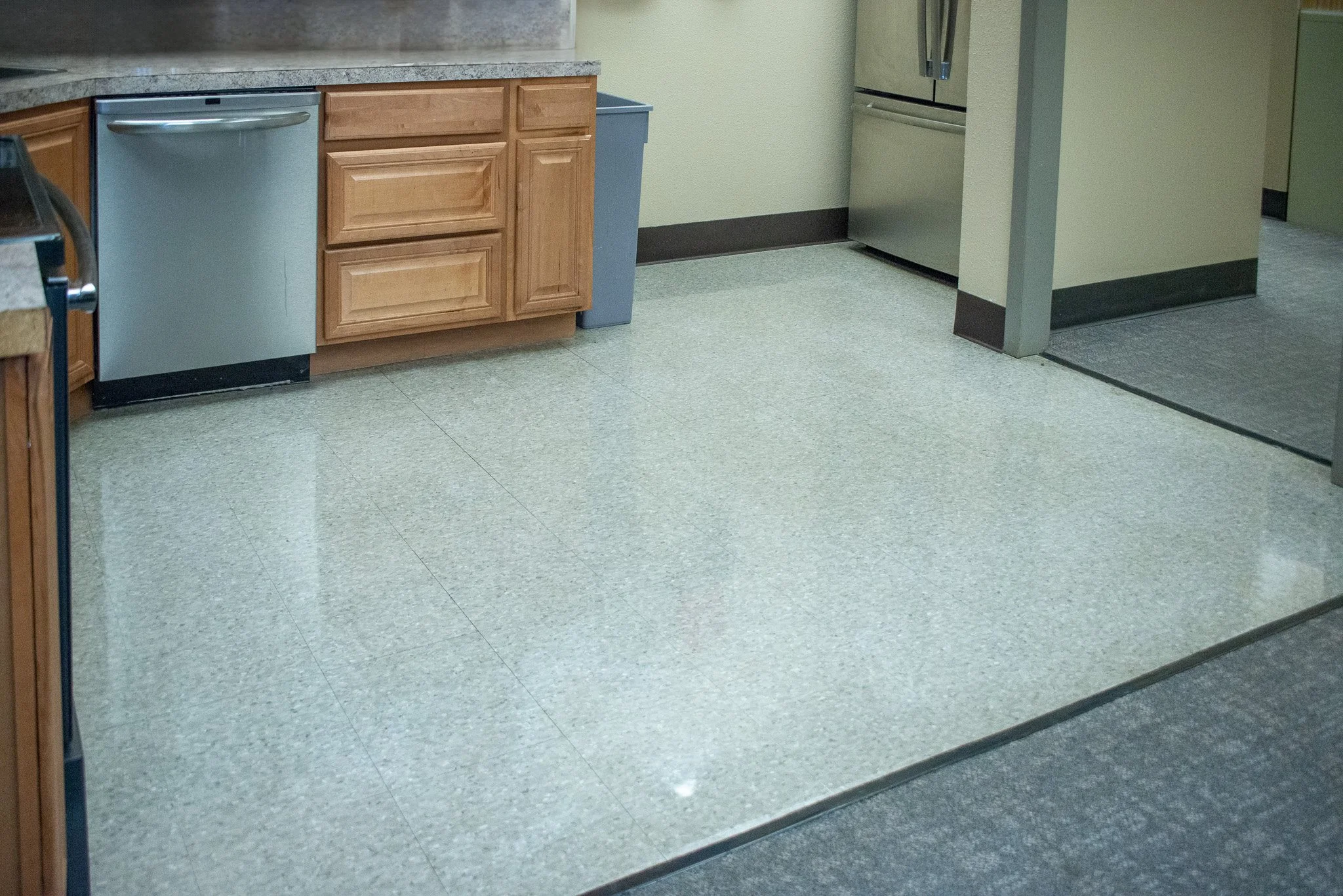 Office kitchen featuring clean floor