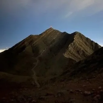Frenchman Mountain in Las Vegas, Nevada. Mountain landscape with sharp peaks and a clear sky. Photo taken by Luc Gensler. 