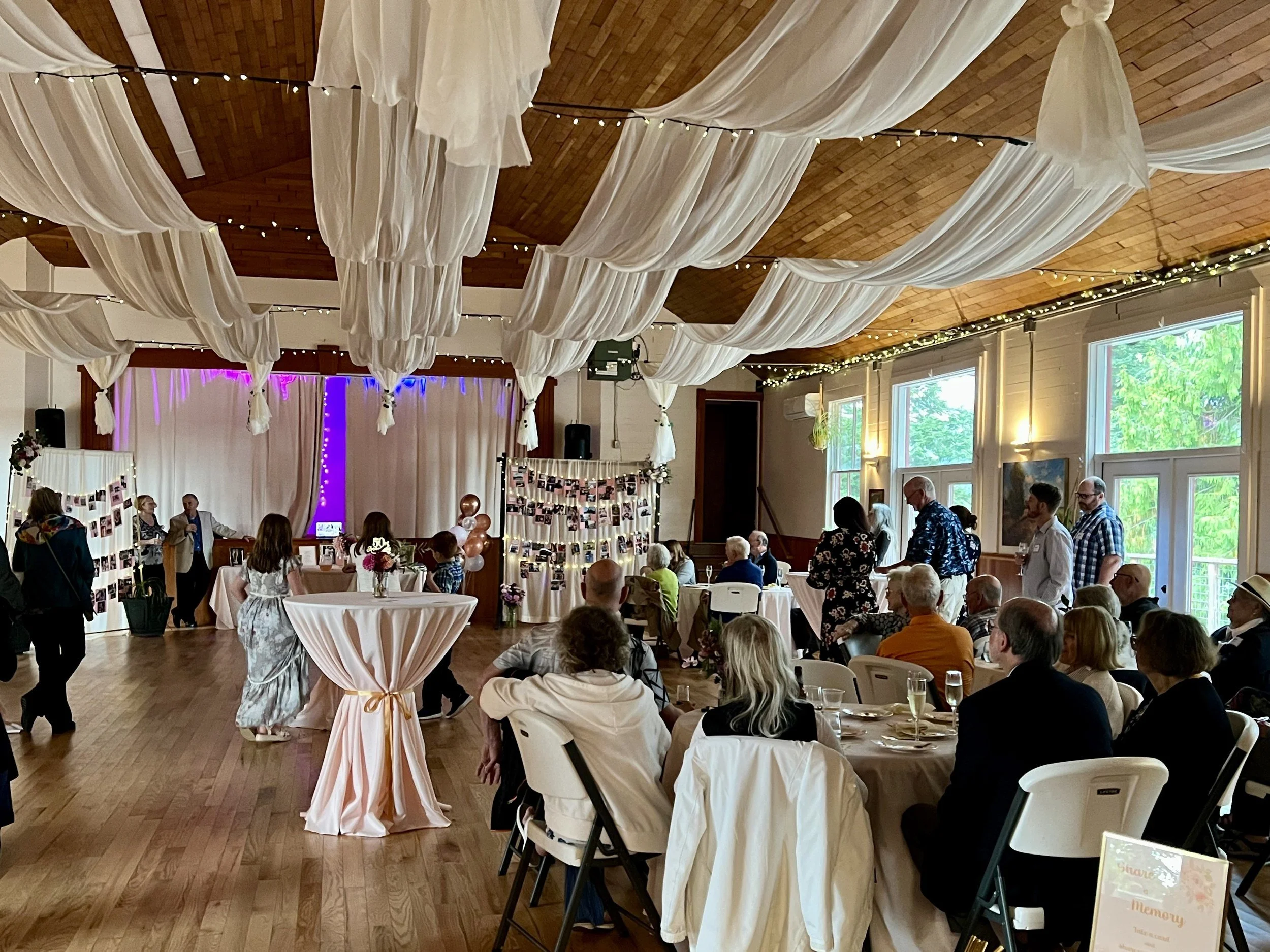 Reception in the main hall under the draped ceiling