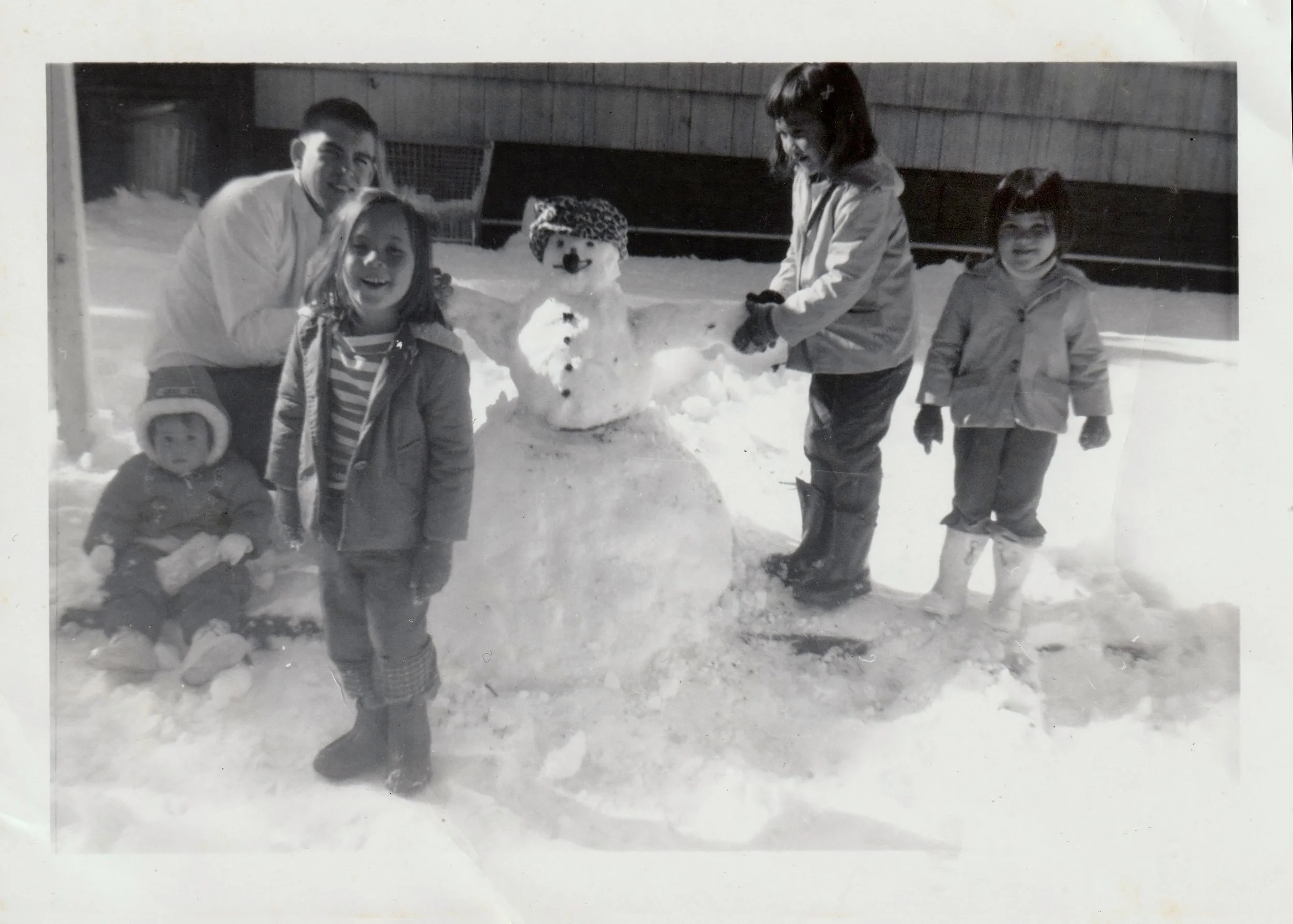 Us in the snow with Uncle Victor.jpeg
