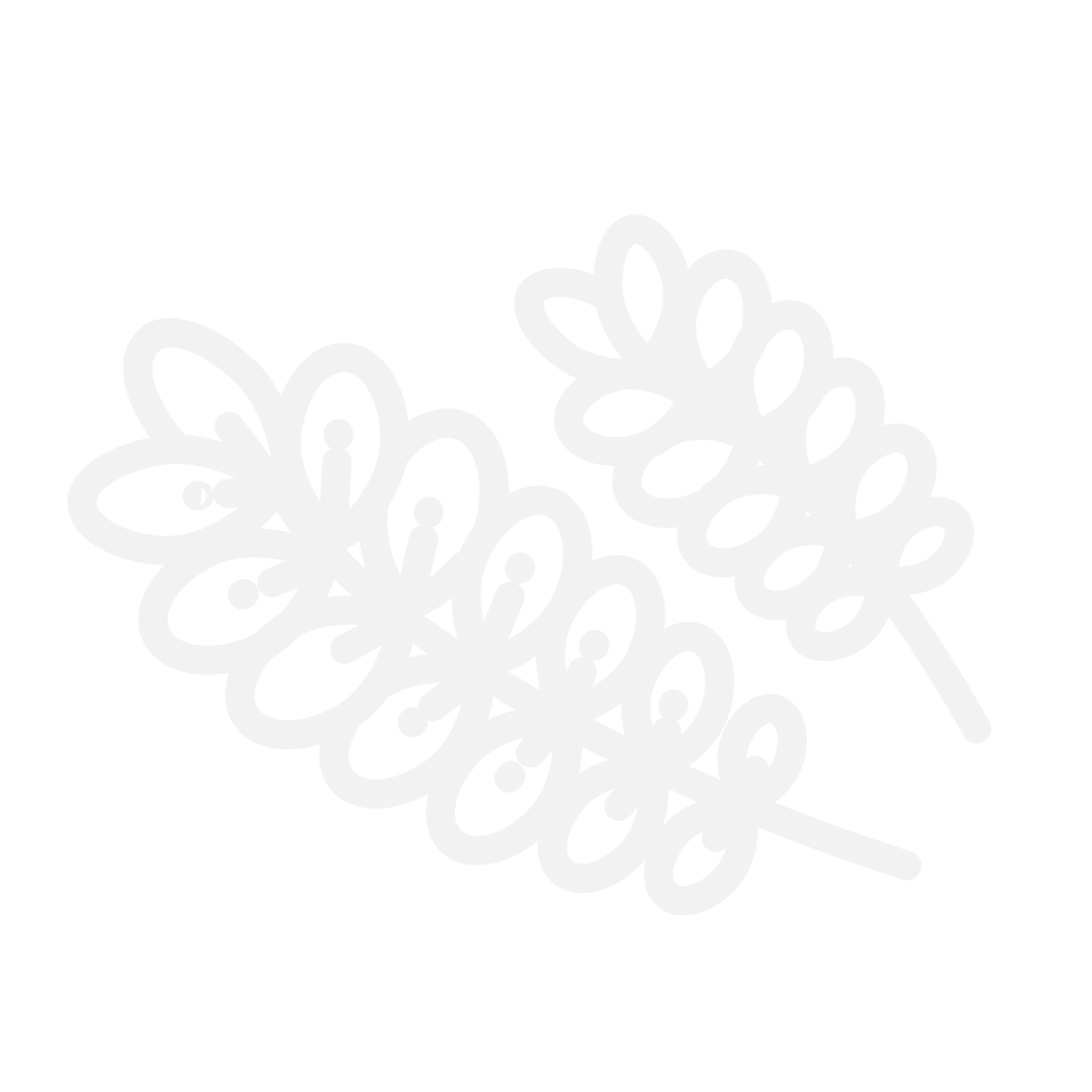 Outline of two decorative leaves with intricate cutout patterns on a black background.