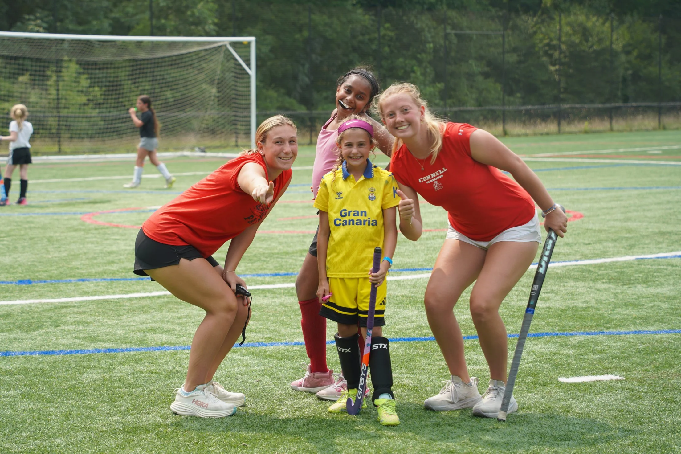 Students and camp counselors at Girls Field Hockey camp.