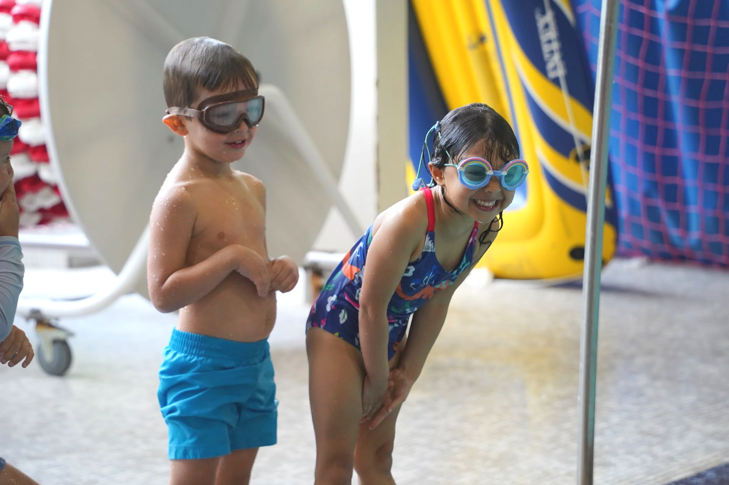 Two summer campers in swimming gear