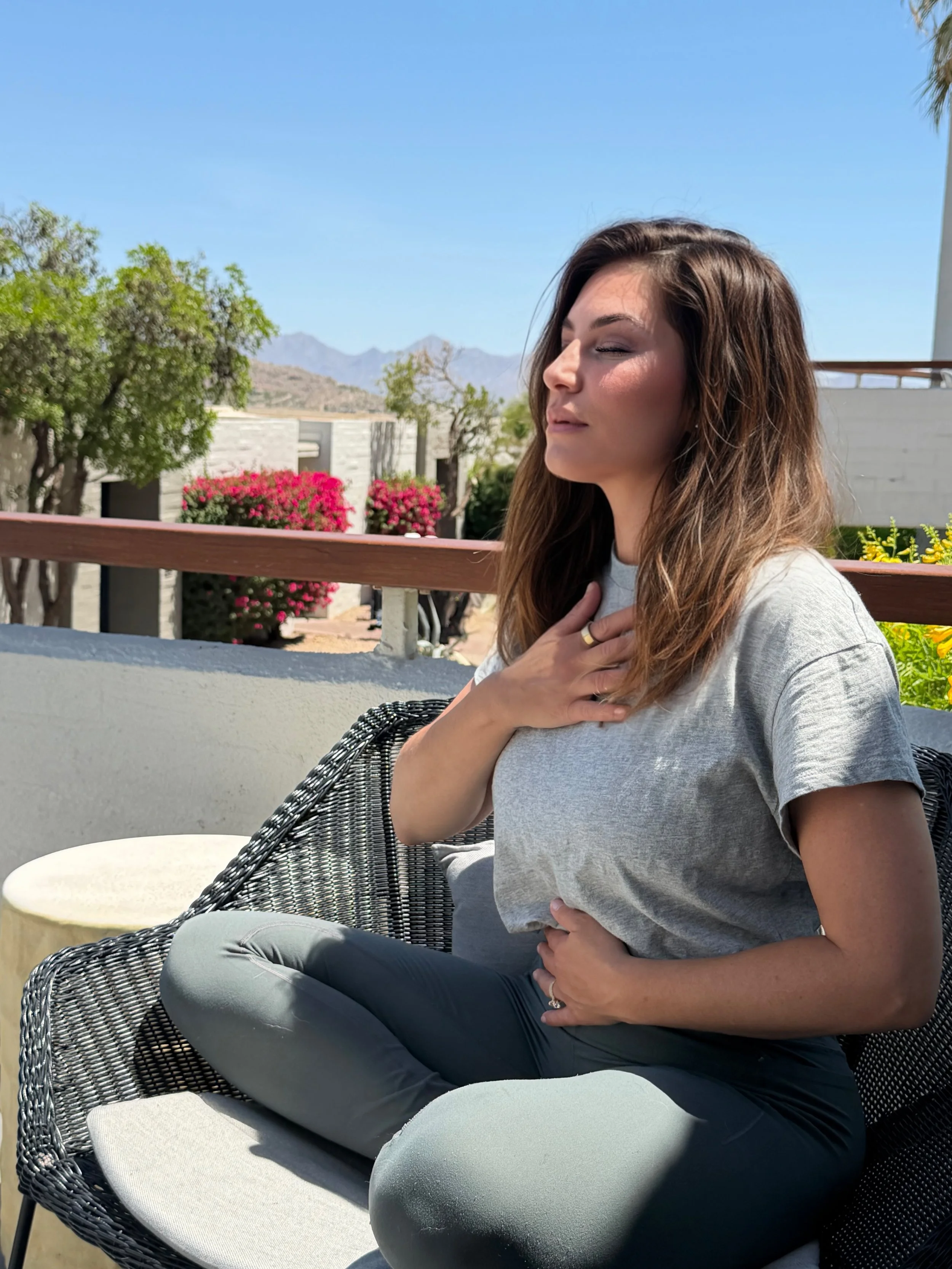 Woman lying down during a transformational breathwork session for nervous system regulation