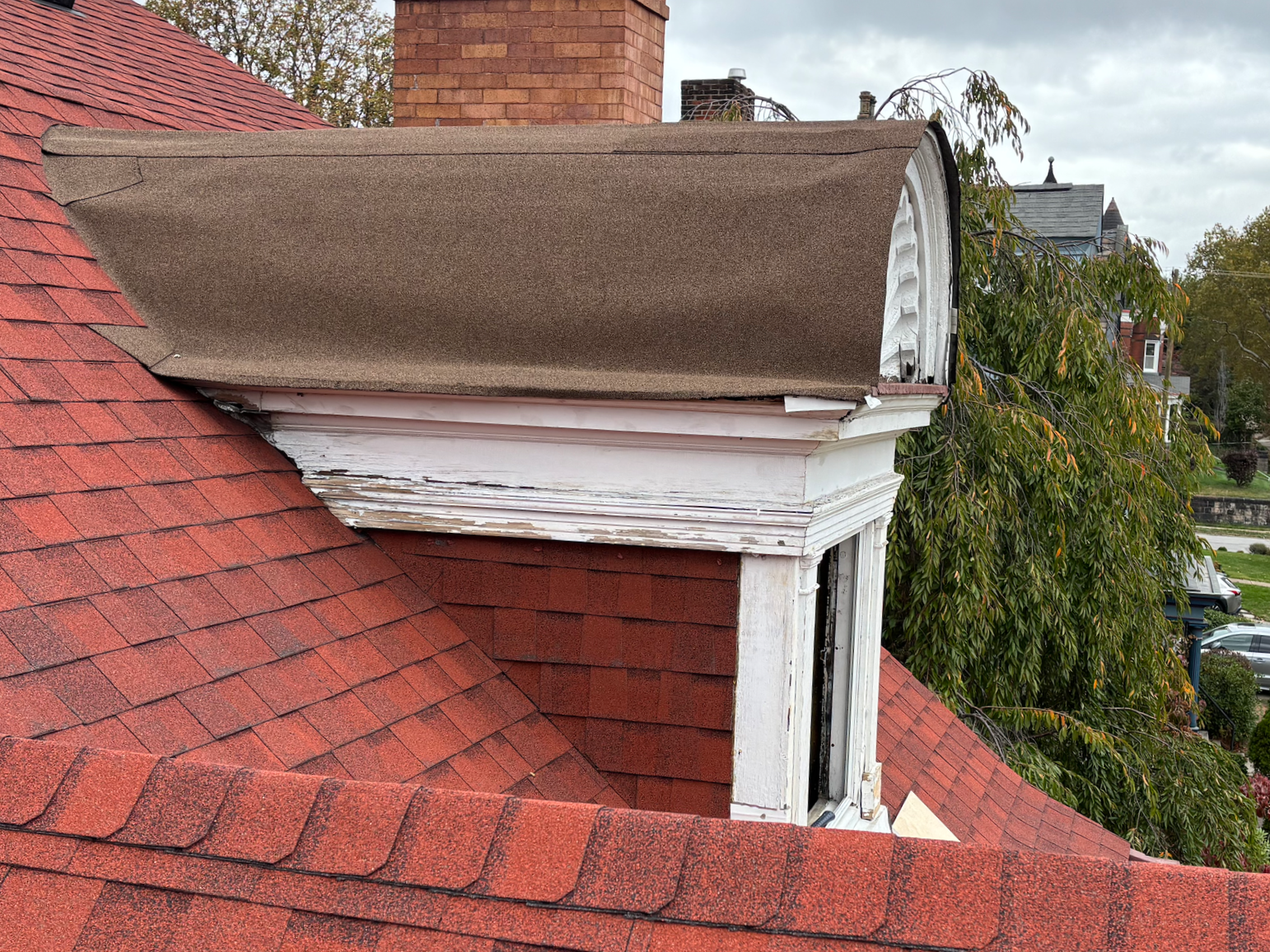 For my own safety, and in order to prevent damage to the roof and box gutter, large platforms were built under each 3rd floor gable. 