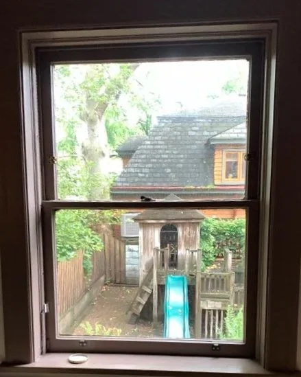Most of their windows only required minor repair and maintenance.  Among other issues, this kitchen window had its sashes painted shut, broken sash chains, and deteriorated paint.  