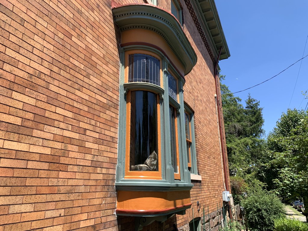 After carefully dismantling the sill and lower fascia, new pieces were fabricated from Spanish cedar supplied by Allied Millwork to match the originals.