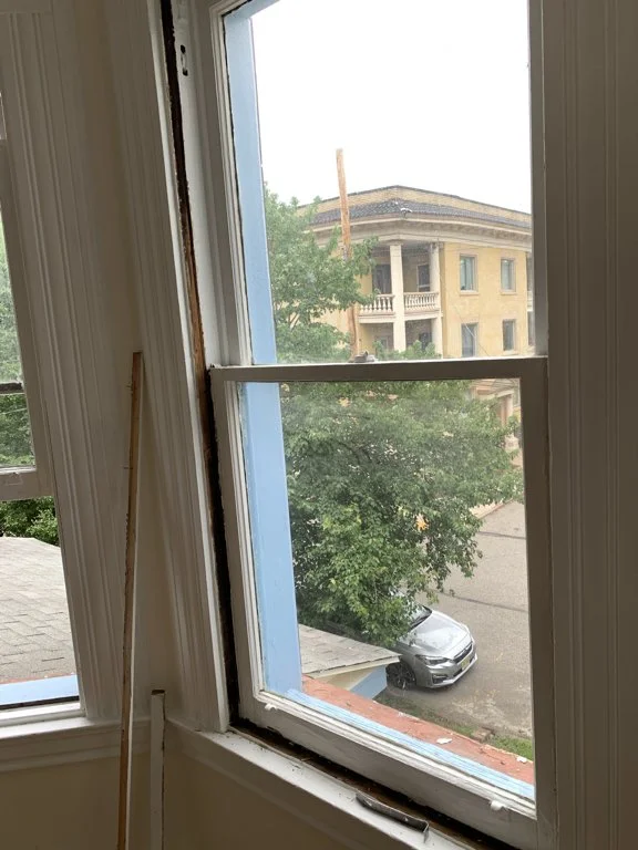 These windows had brass weather strips, most of which were cleaned and salvaged. The frame's sash channels, the ends of the sashes, and all other moving wood to wood surfaces were waxed with carnauba wax. 