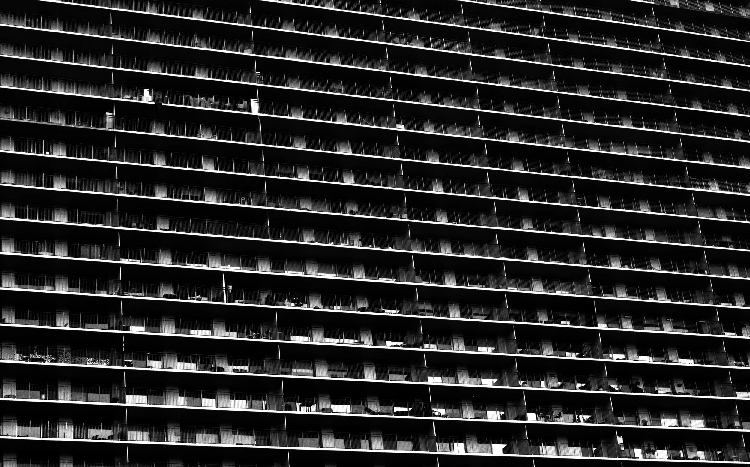 black and white photo of an apartment building