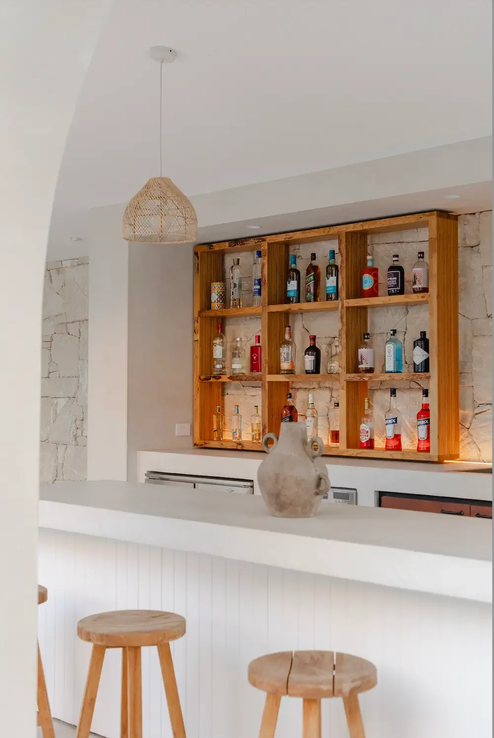 Coastal outdoor microcement bar area perfect for Alabama and Florida Gulf Coast Luxury new construction or renovations.