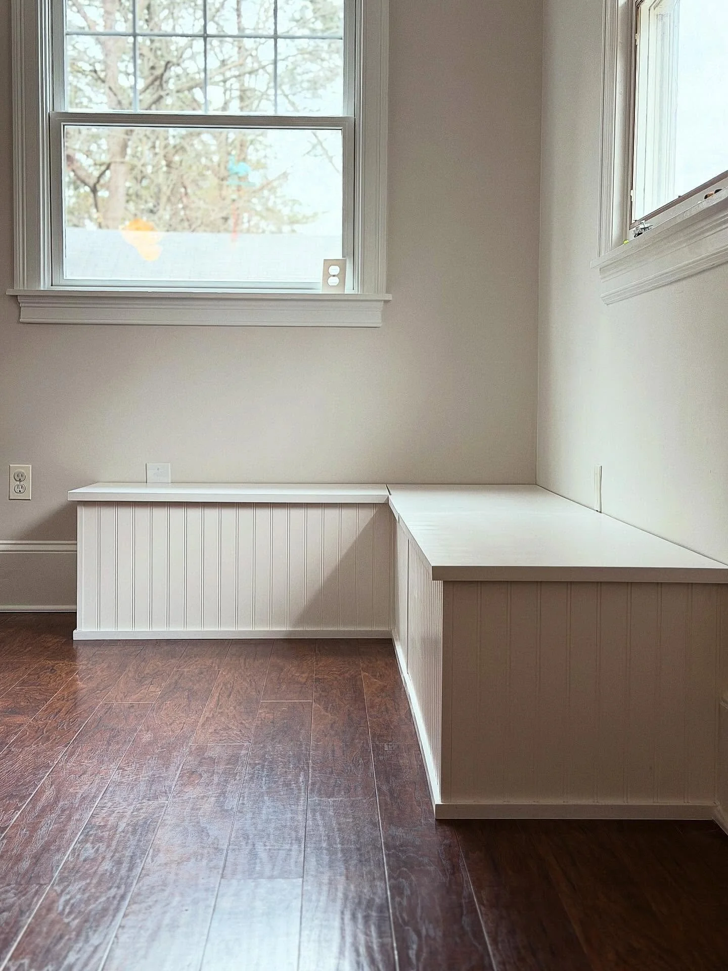 Simple design with maximum storage. This bench seat was built to fit the space perfectly and give this big family plenty of extra storage.  #banquettebench #customcabinetry #moorestown