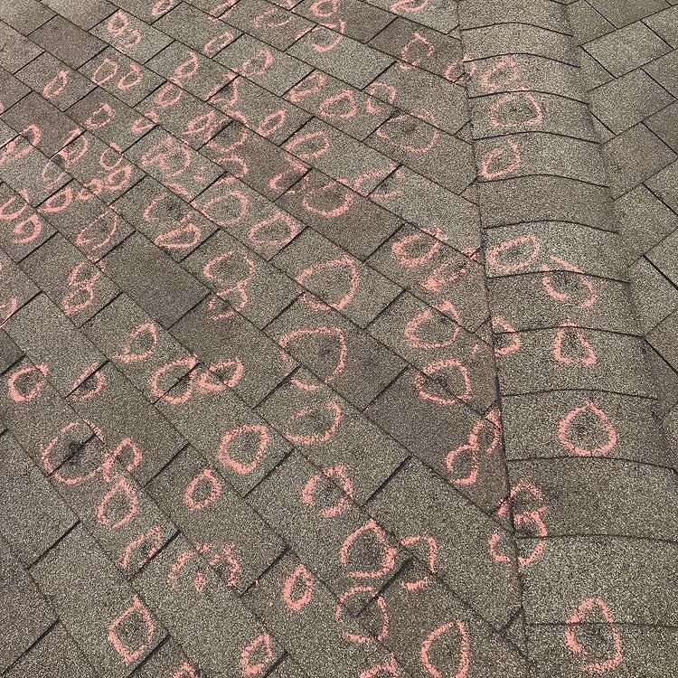 hail damage marked on roof
