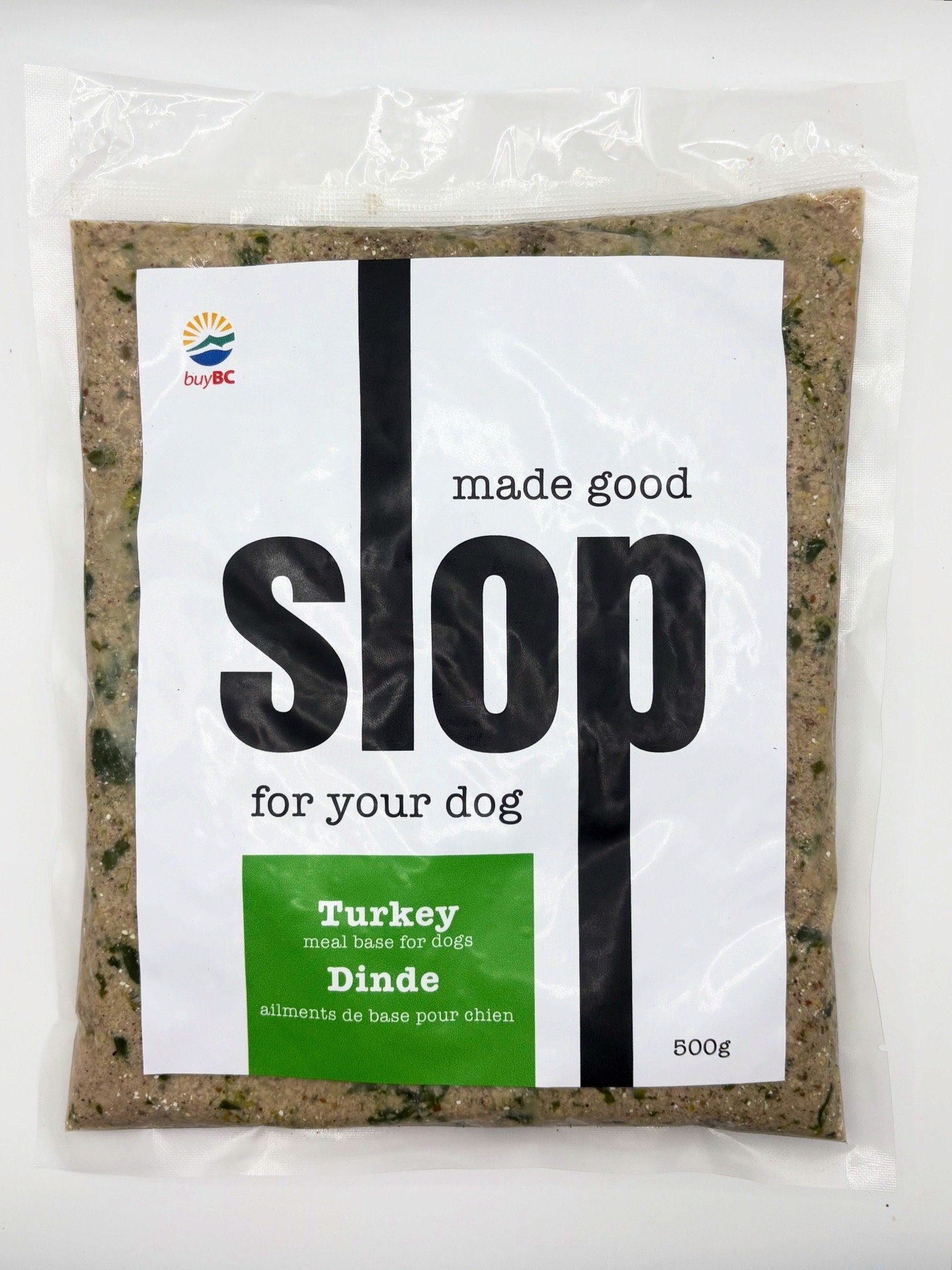 Packet of slop dog food labeled 'Made good for your dog, turkey flavor, 500g, in a clear plastic bag with a white and green label.'