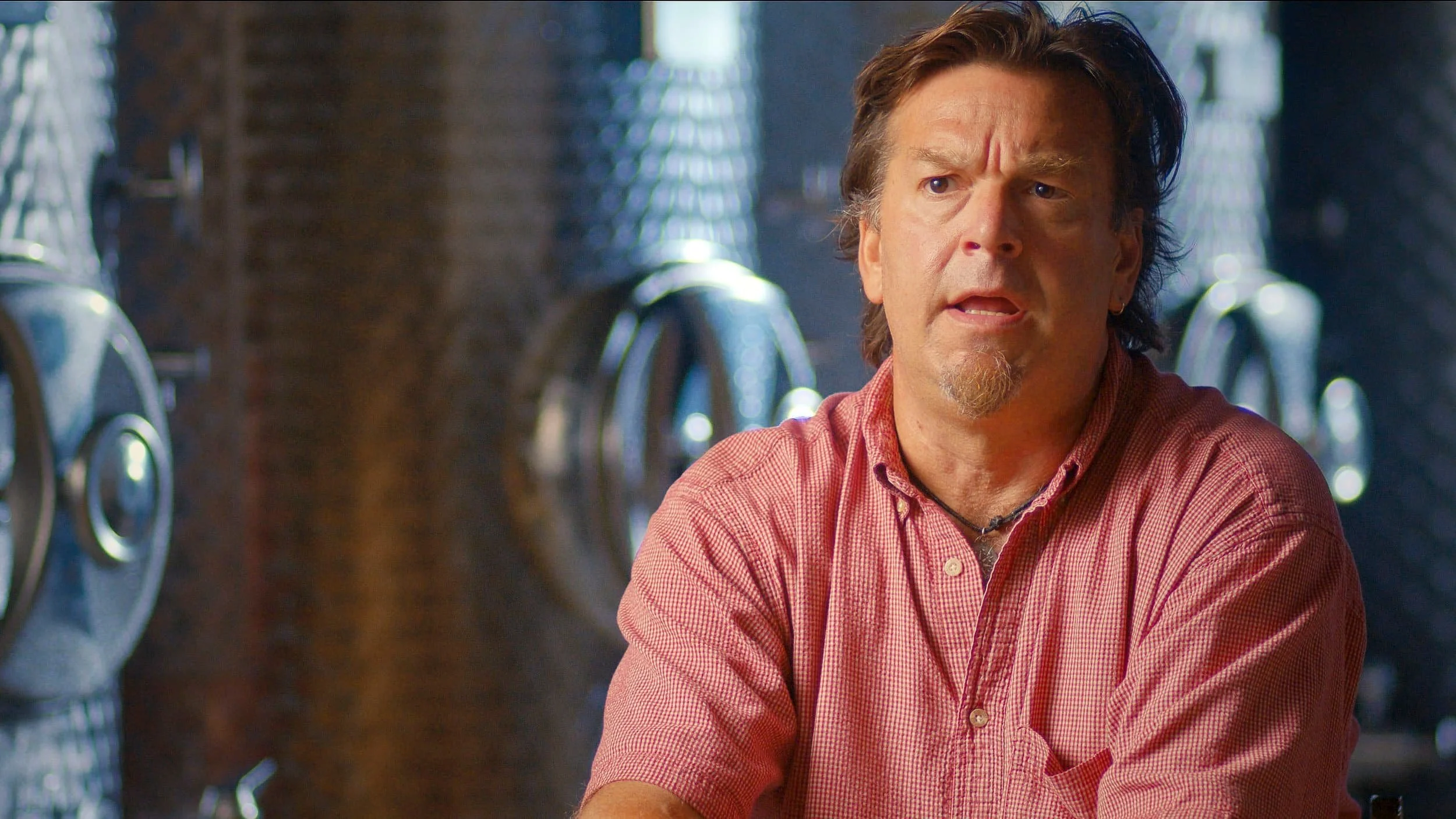 the cidermaker of castle hill cider sits for an interview about his cider making process