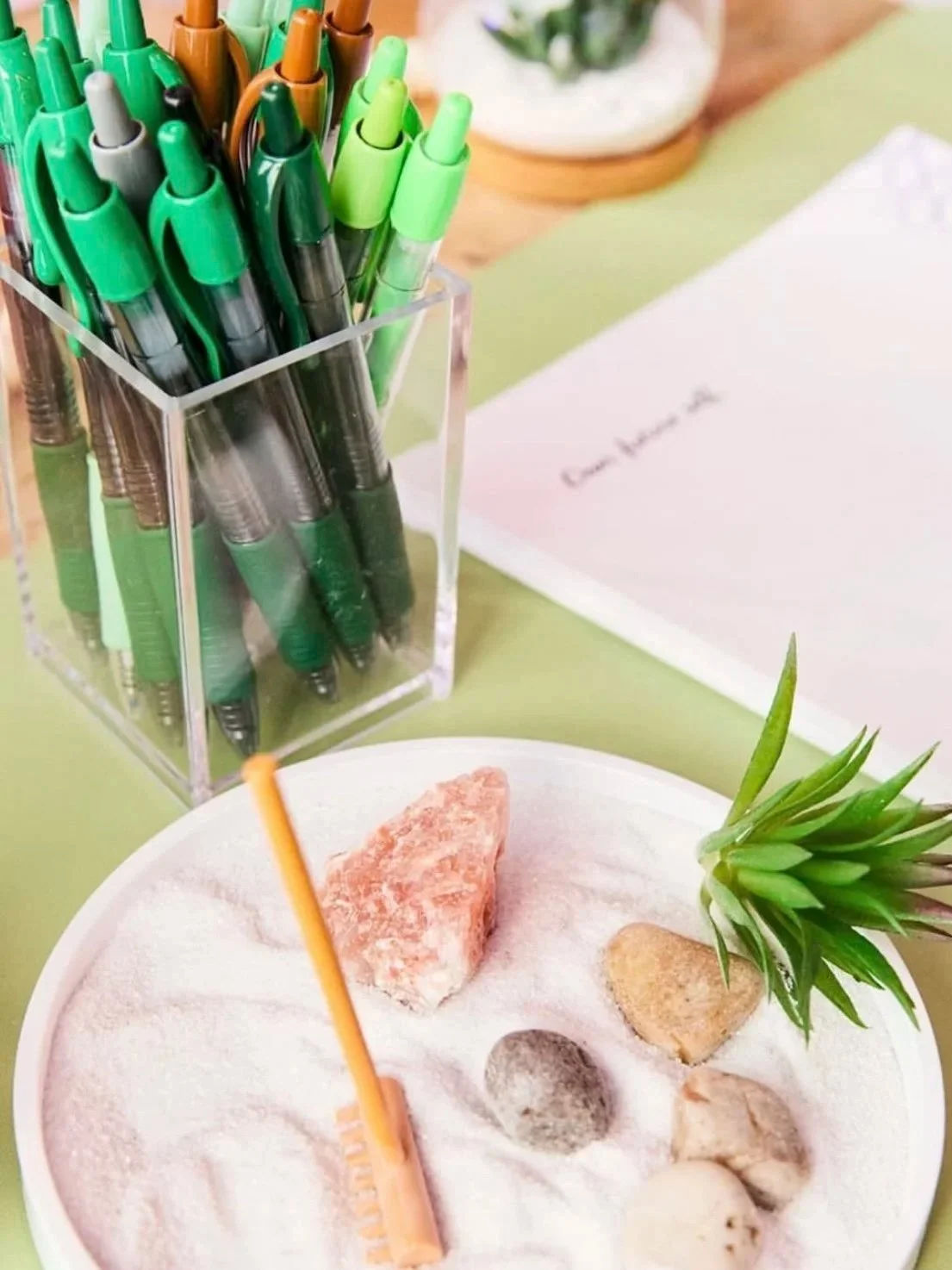 Balance (Green): A calming desk setup with a zen sand garden