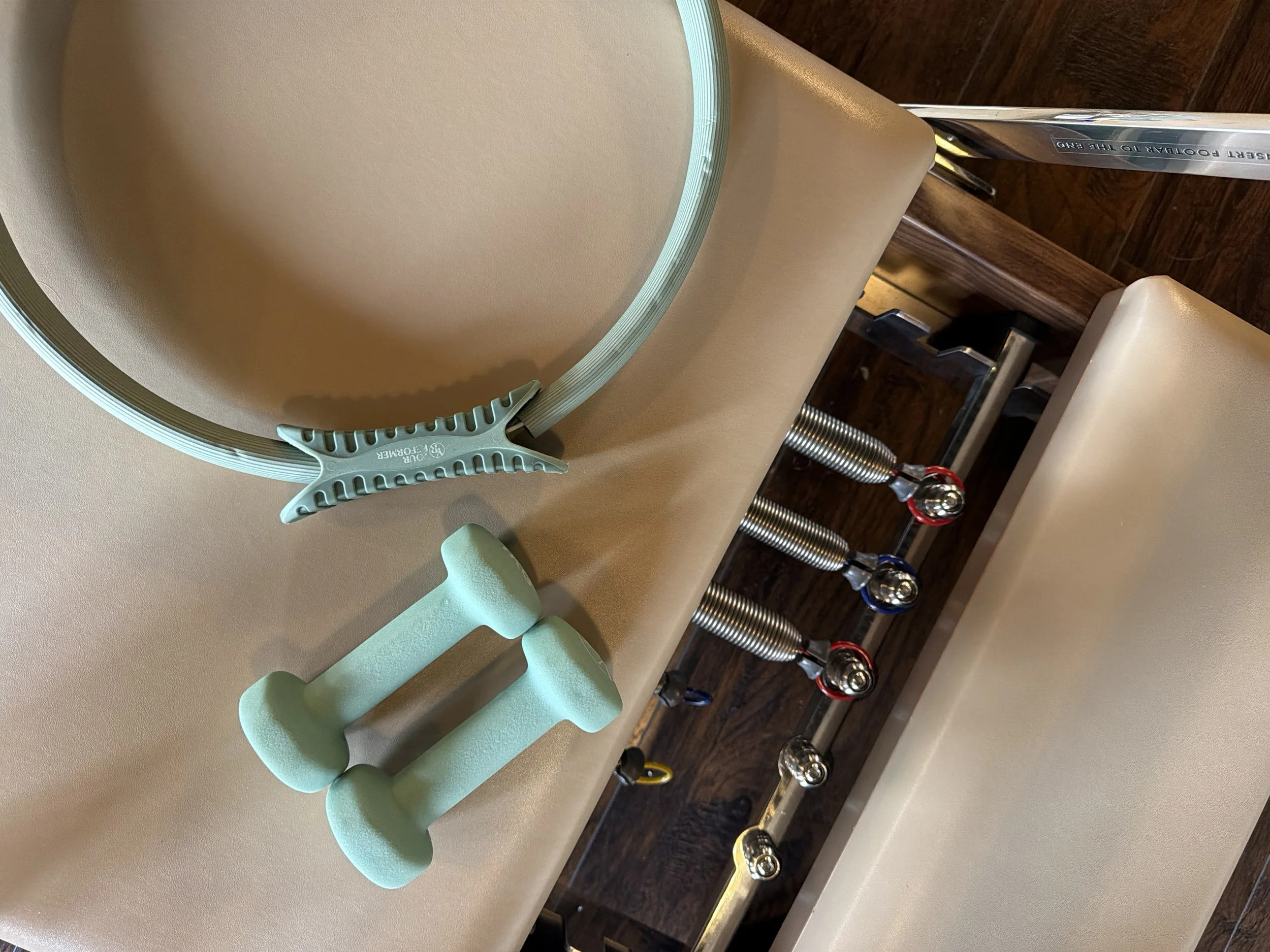 close up of pilates socks sitting on a reformer