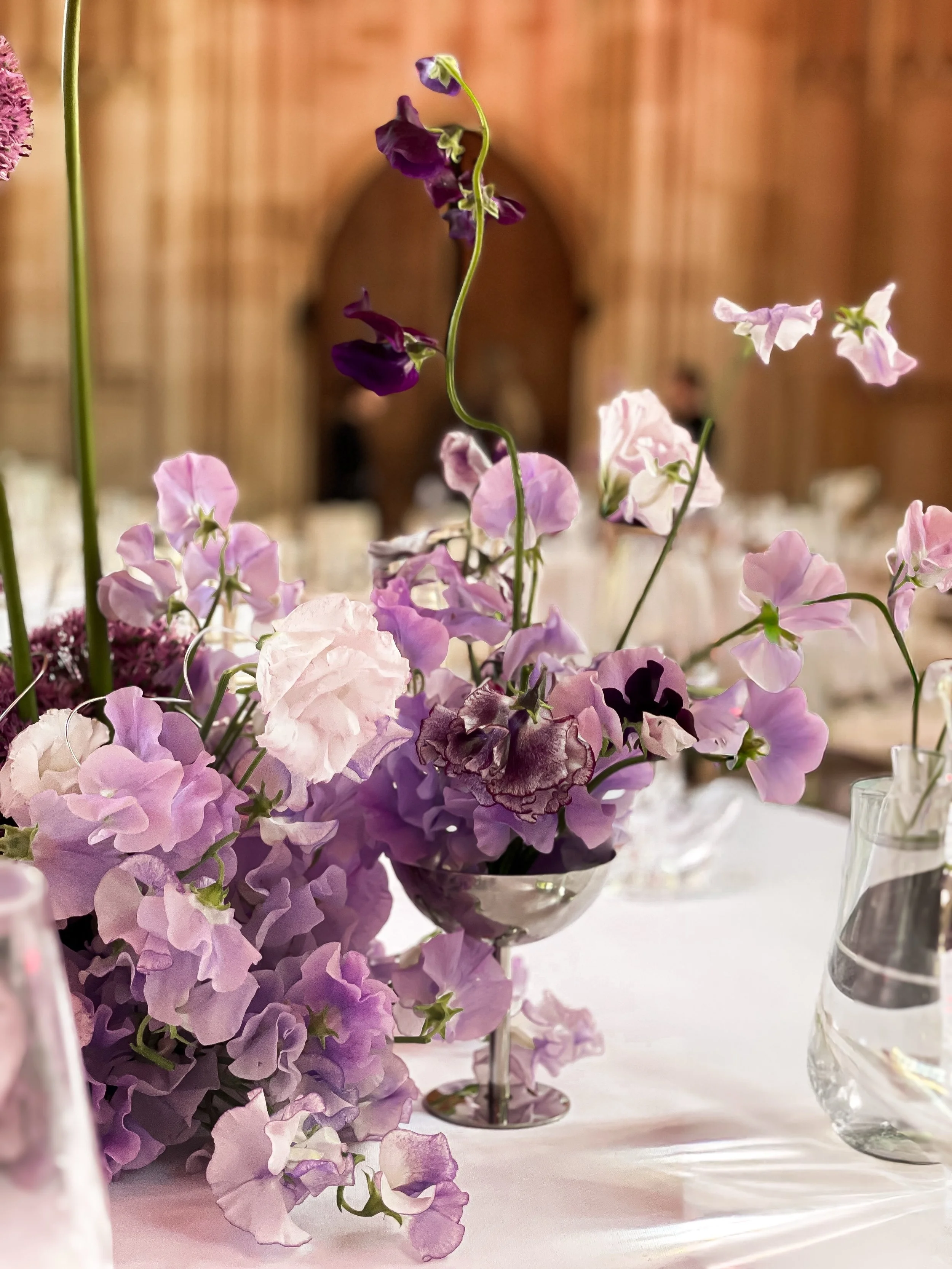 Sweet pea, alliums and layered lilacs against centuries-old architecture, designed to feel soft, atmospheric and quietly striking.

Designed for @hostinger at the Bodleian Library.