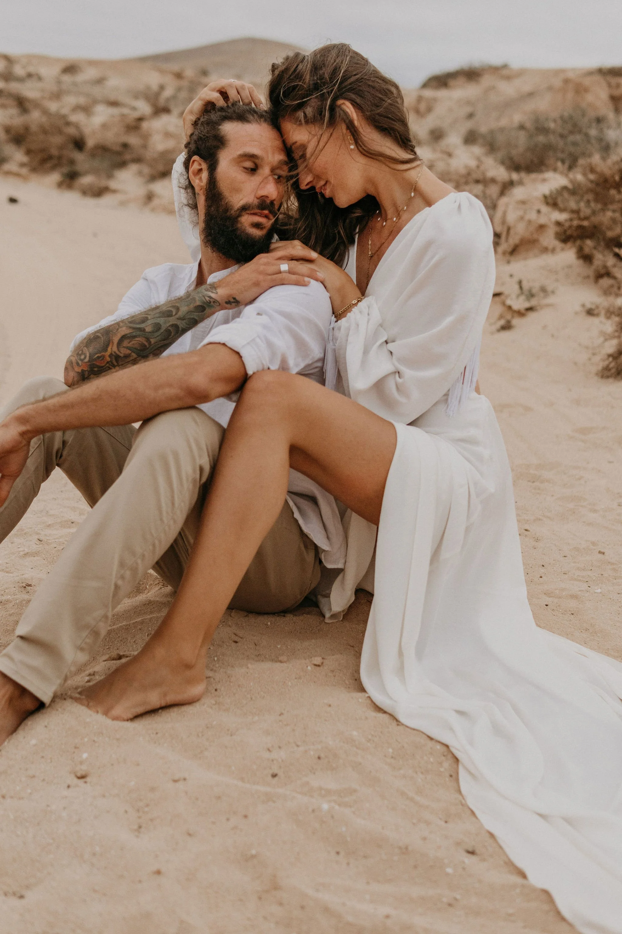 Intimate hug between loved birds during their Elopement on Fuerteventura Spain.