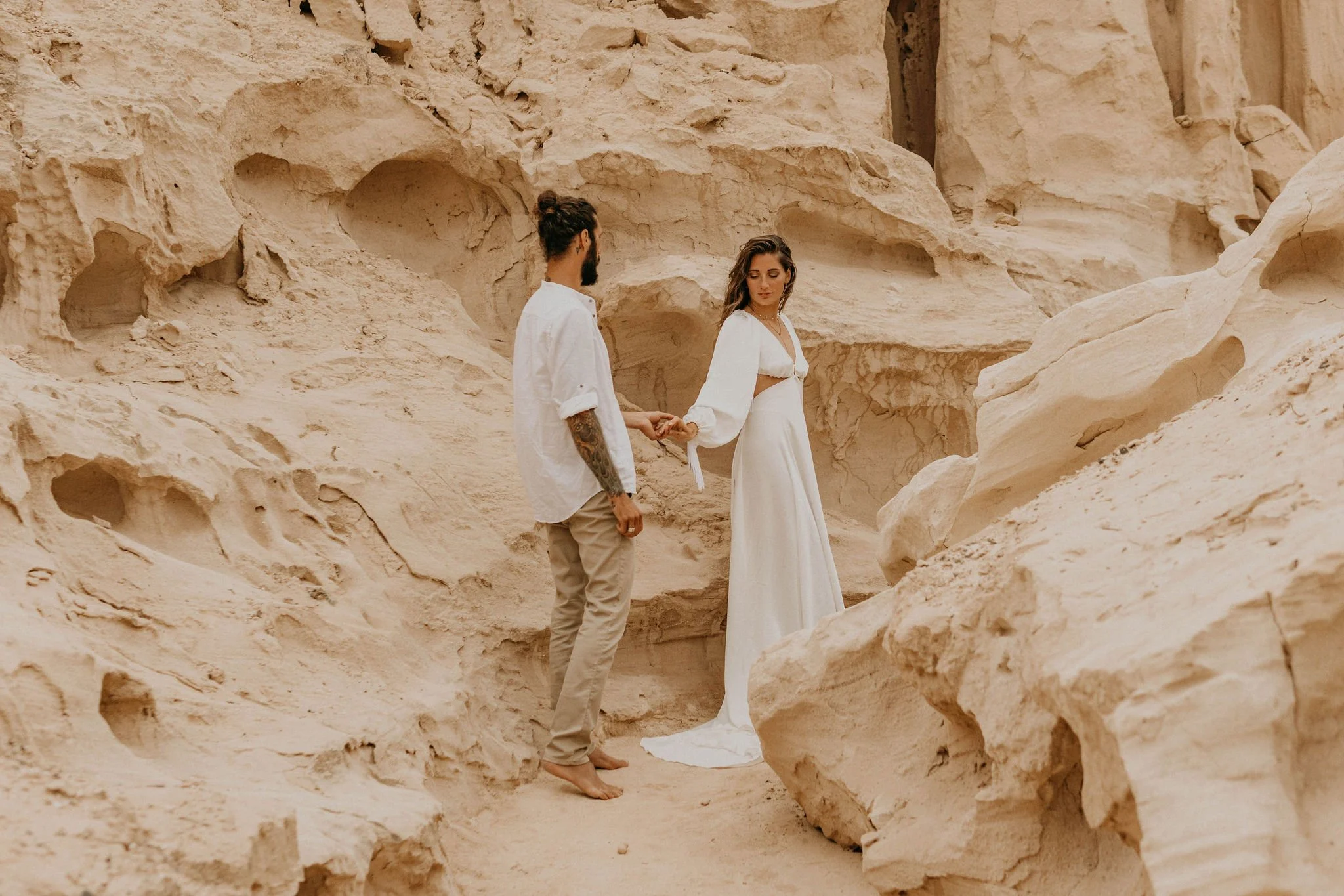 Couple holding hands during their couple shoot for their elopement in Spain.