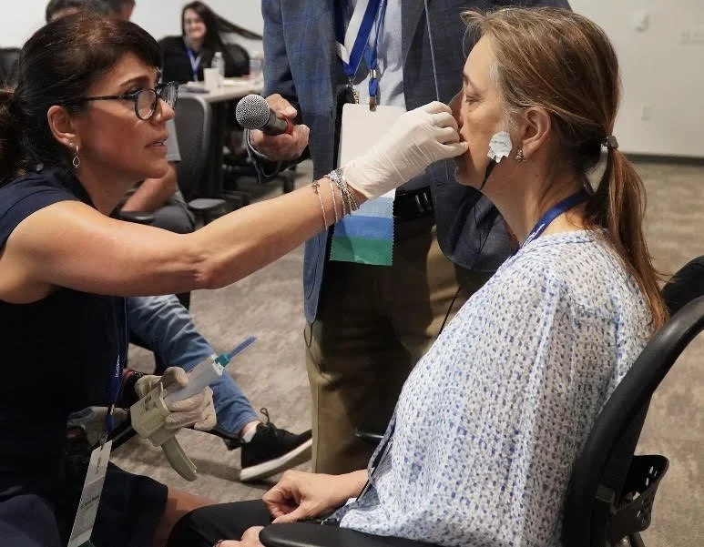 Woman receiving tensing treatment