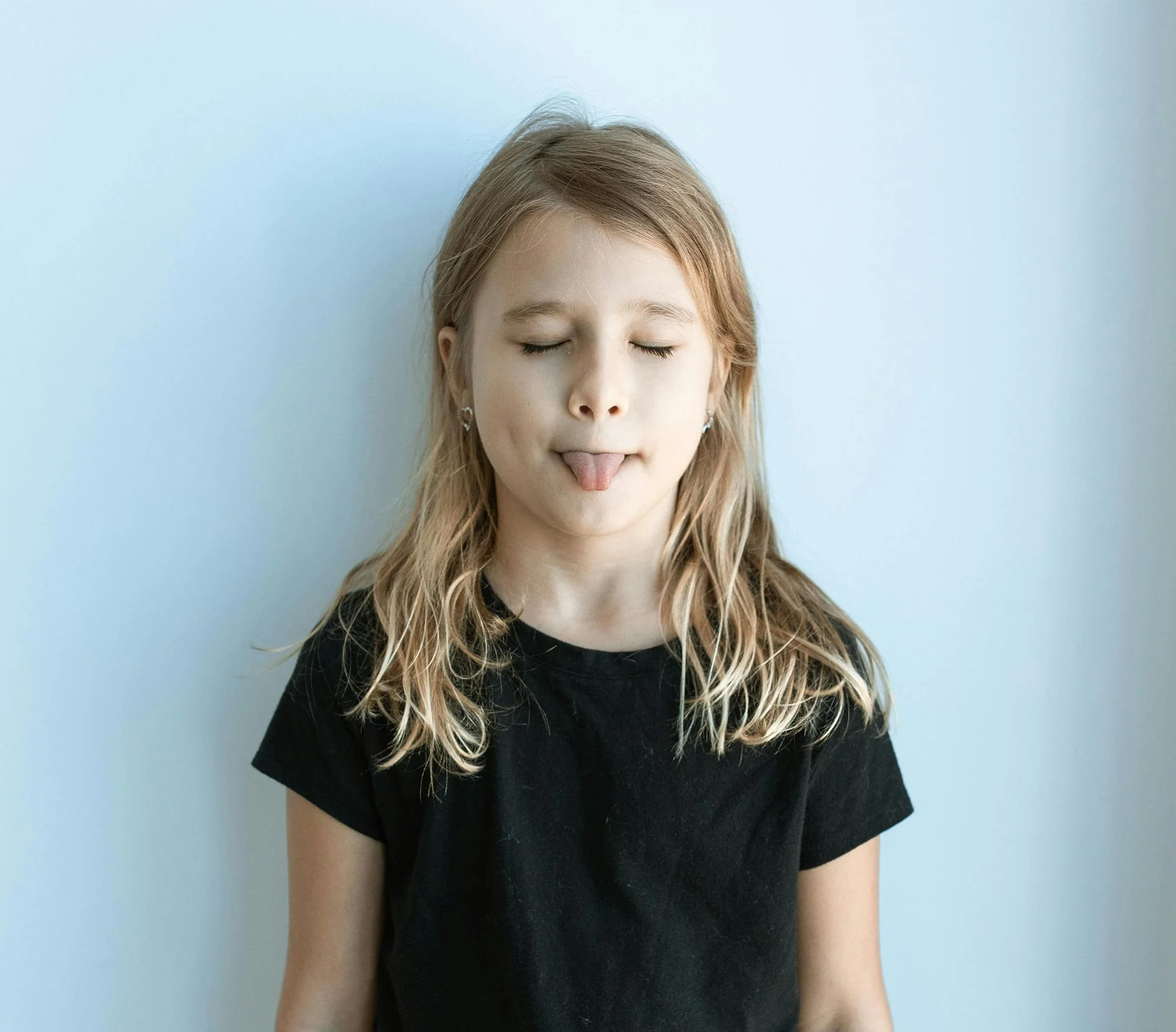 Girl sticking tongue out