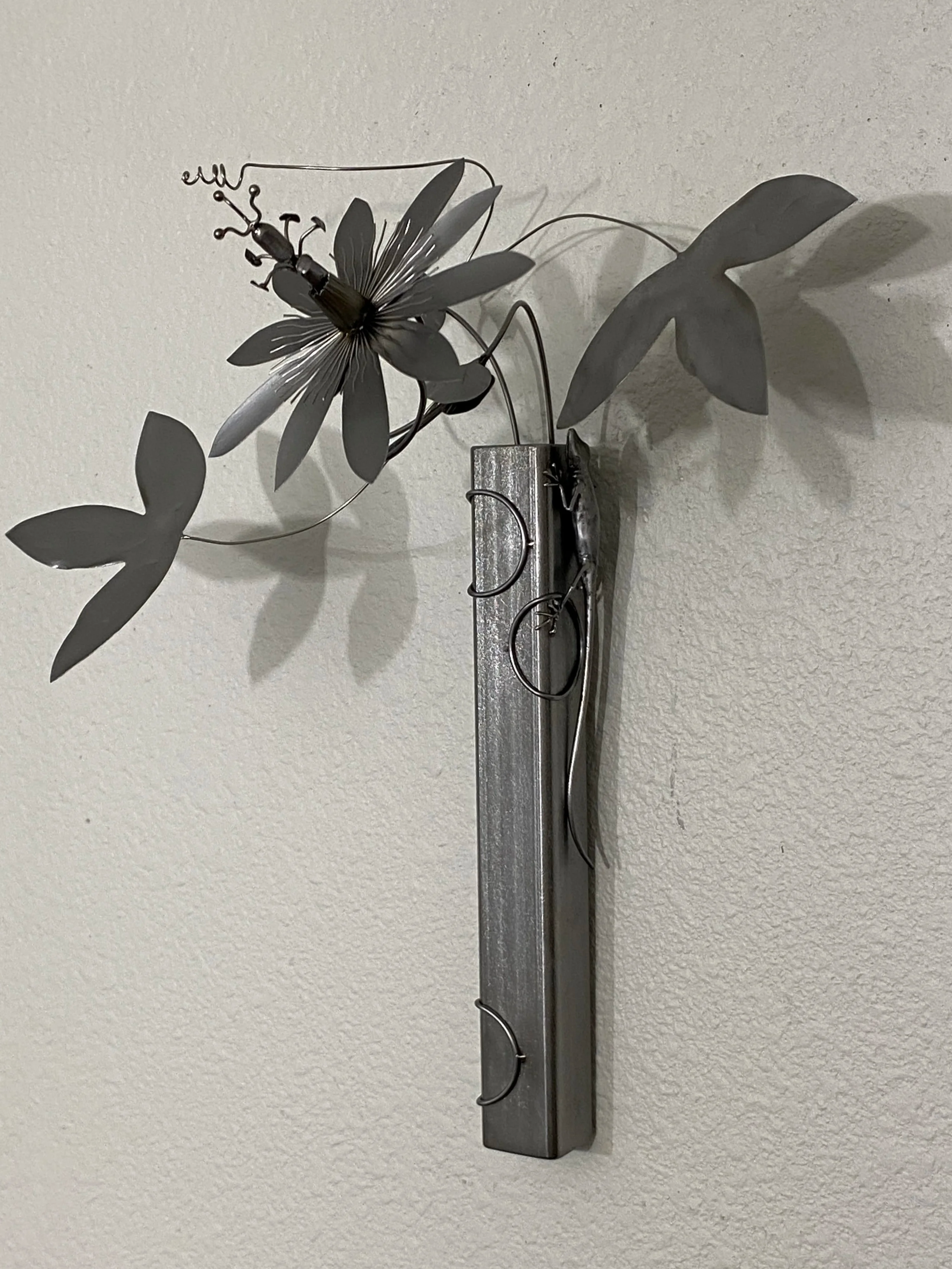 "Passion: 02/05", 2025, Steel+CC, 12"Hx8"Wx8"D. Wall hanging sculpture.  Available - email for info.