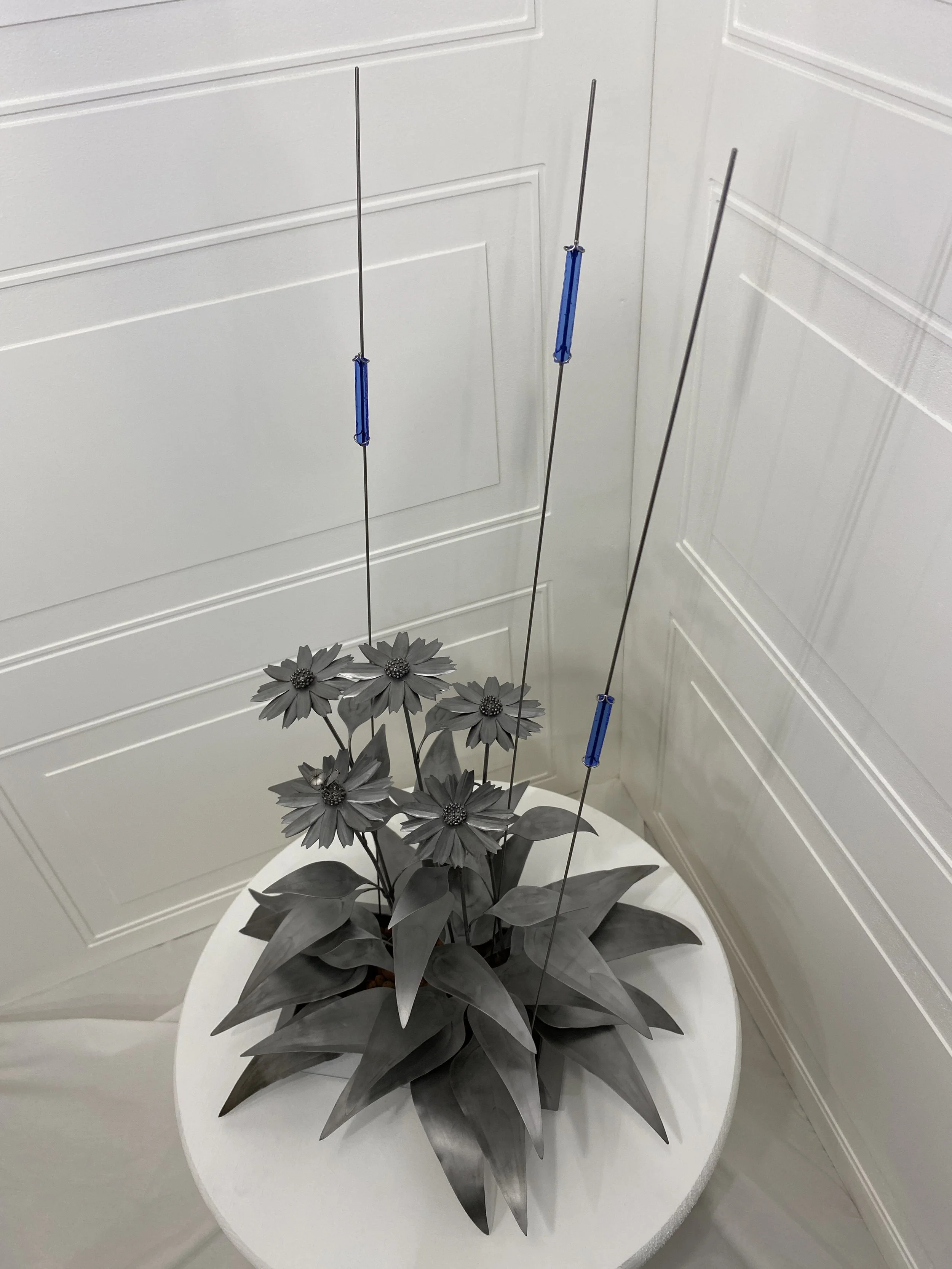 "Warm Rain", 2025, Steel+Glass+Lava Pebbles+CC, 26"Hx14.5"Wx13.5"D. Available - email for info.