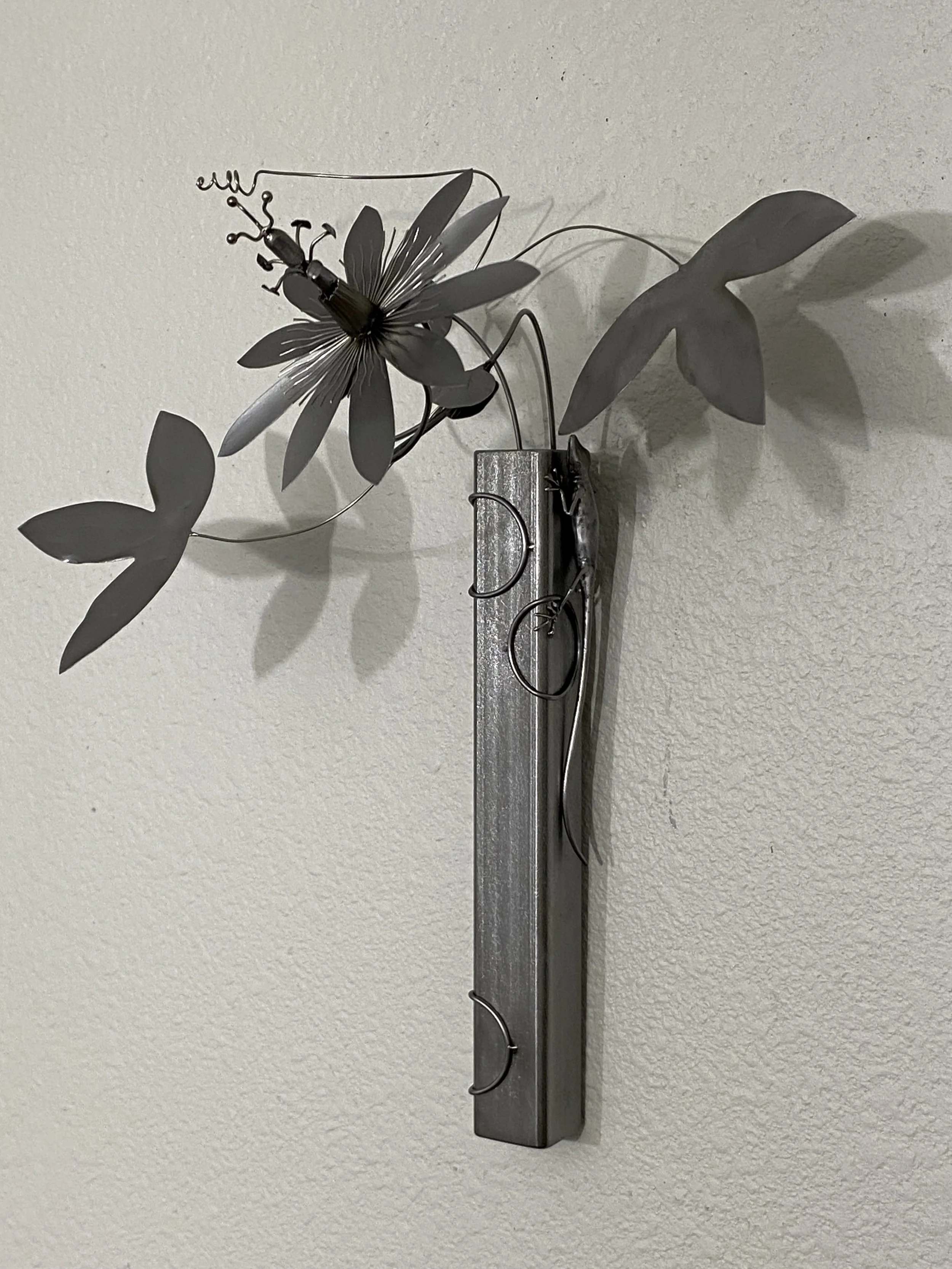 "Passion: 02/05", 2025, Steel+CC, 12"Hx8"Wx8"D. Wall hanging sculpture.  Available - email for info.