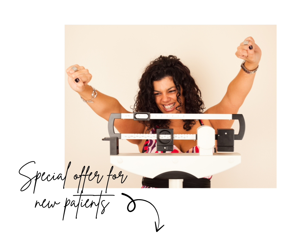 A woman with curly dark hair smiling and raising her arms in victory on a scale after doing medical weight loss in Tampa, FL, with a blurred partial text 'offer for' visible in the corner.