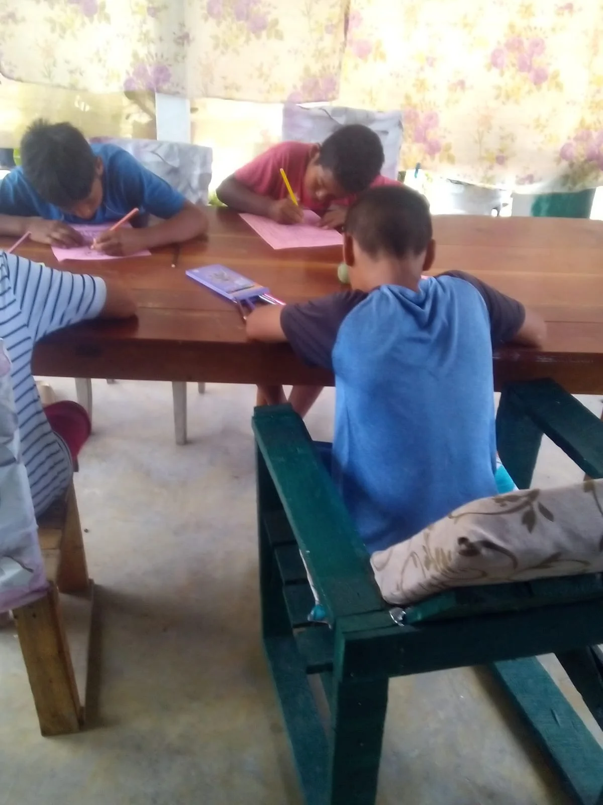 Children learning during a Vacation Bible School (VBS) outreach in Caledonia Village, Corozal District, Belize.