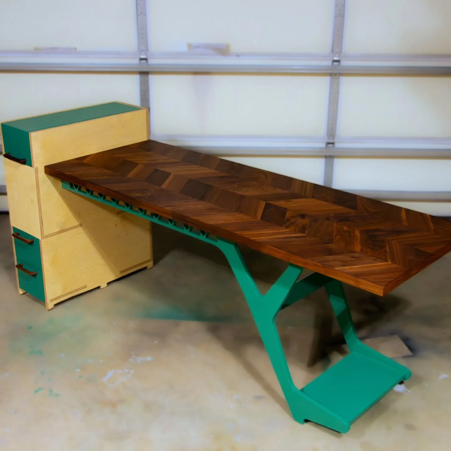 My first Client's desk finished.  Built for an aviation student that needed a storage solution for his extensive simulator equipment, the design draws from their love for aviation.  The use of plywood, raw and painted, is from the extensive usage of 