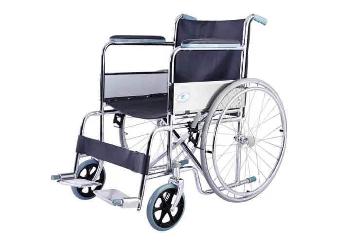 A standard wheelchair with a metal frame, black seat, and large rear wheels, designed for mobility assistance.