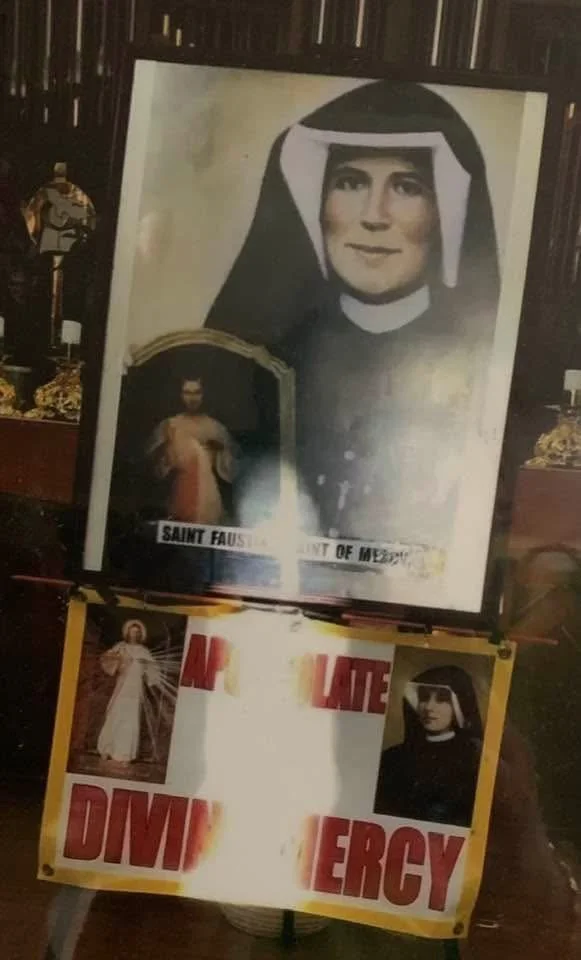 BIG LIGHTED CANDLE IN THE IMAGE OF ST FAUSTINA  FEAST DAY OCT 5