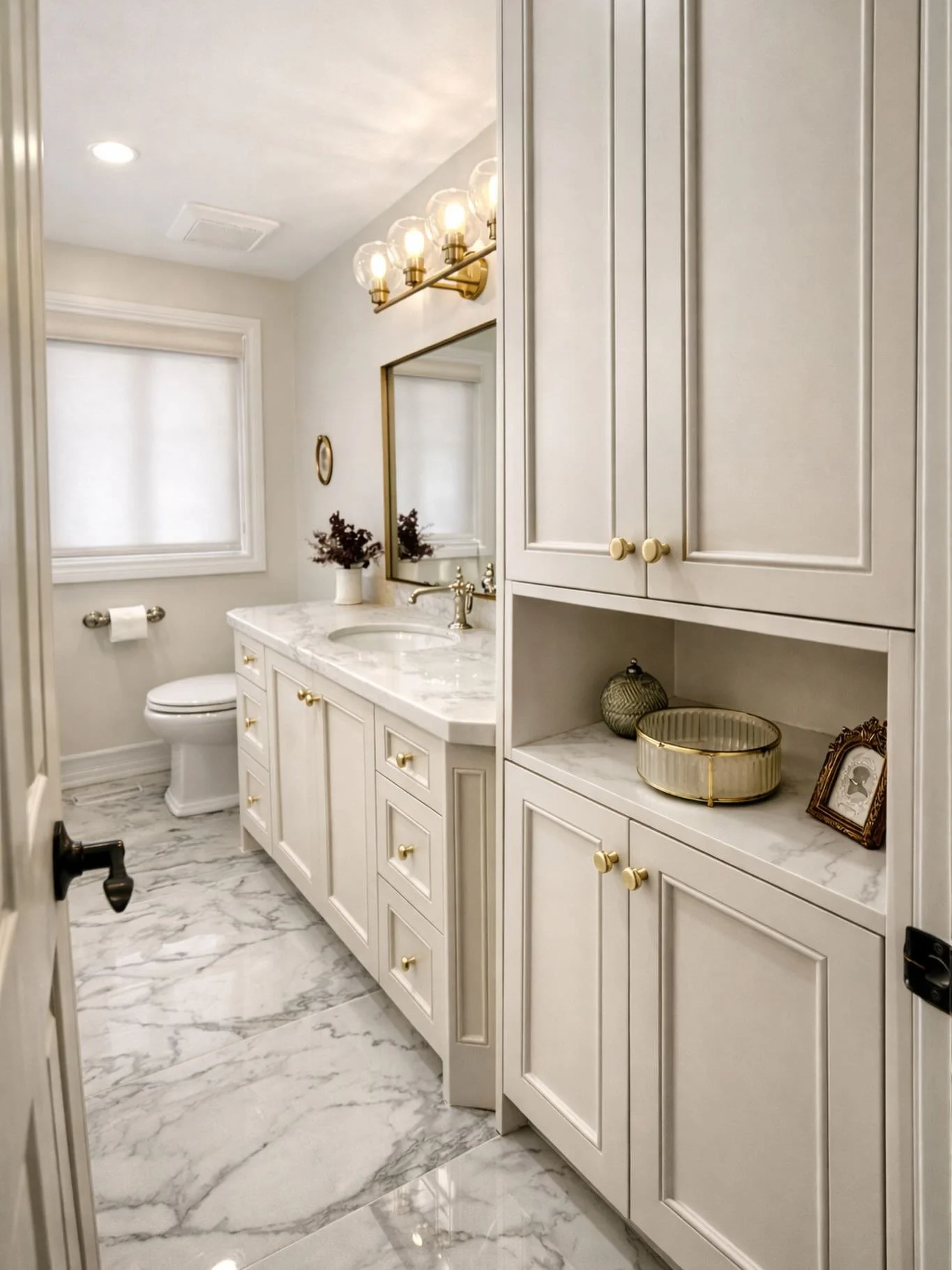 One of my all-time favorite bathroom renovations 🤍

There&rsquo;s something so powerful about leaning into tradition. For this space, we embraced classic detailing, warm neutrals, and layered textures to create a bathroom that feels both elevated an