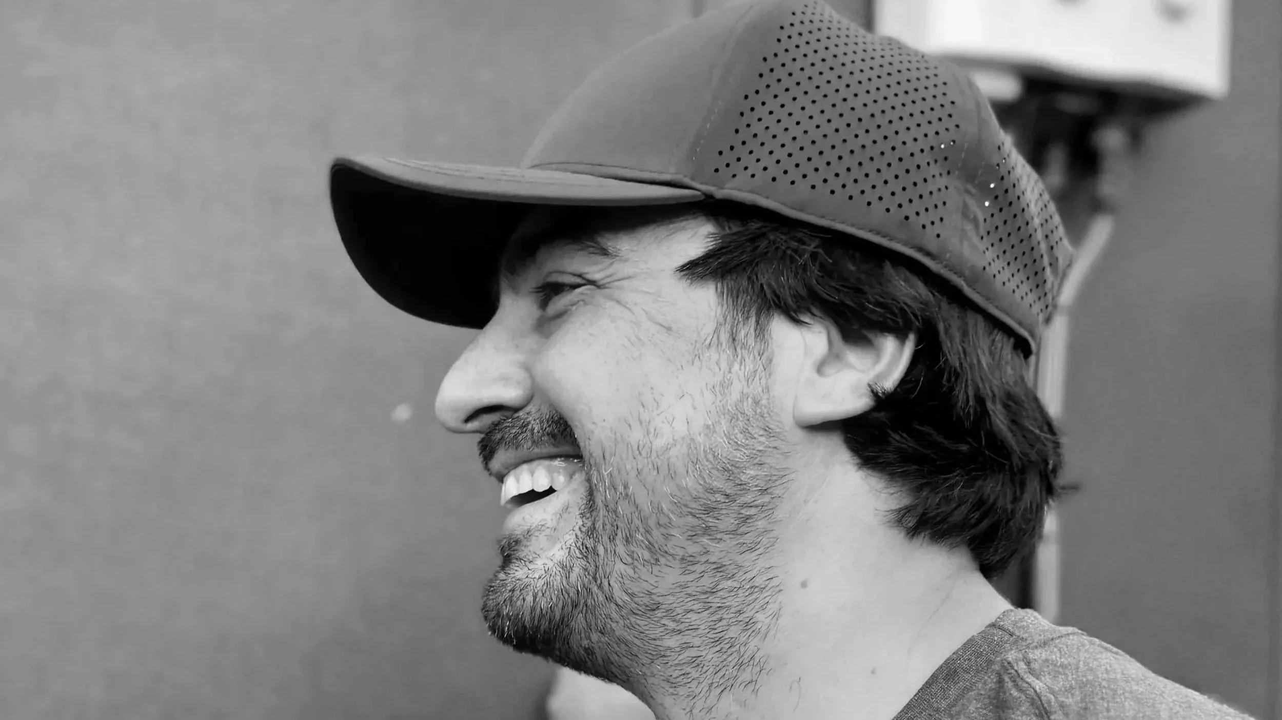 Image of the Soci pizza truck owner Raphael Nieto, smiling in Raleigh, NC.