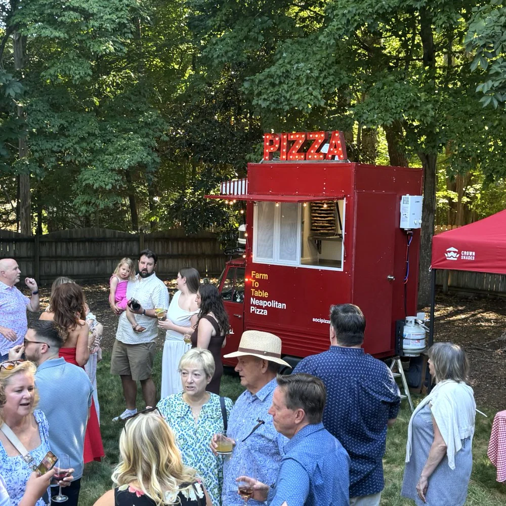 A backyard engagement party in Hillsboro, NC with Soci Pizza truck.