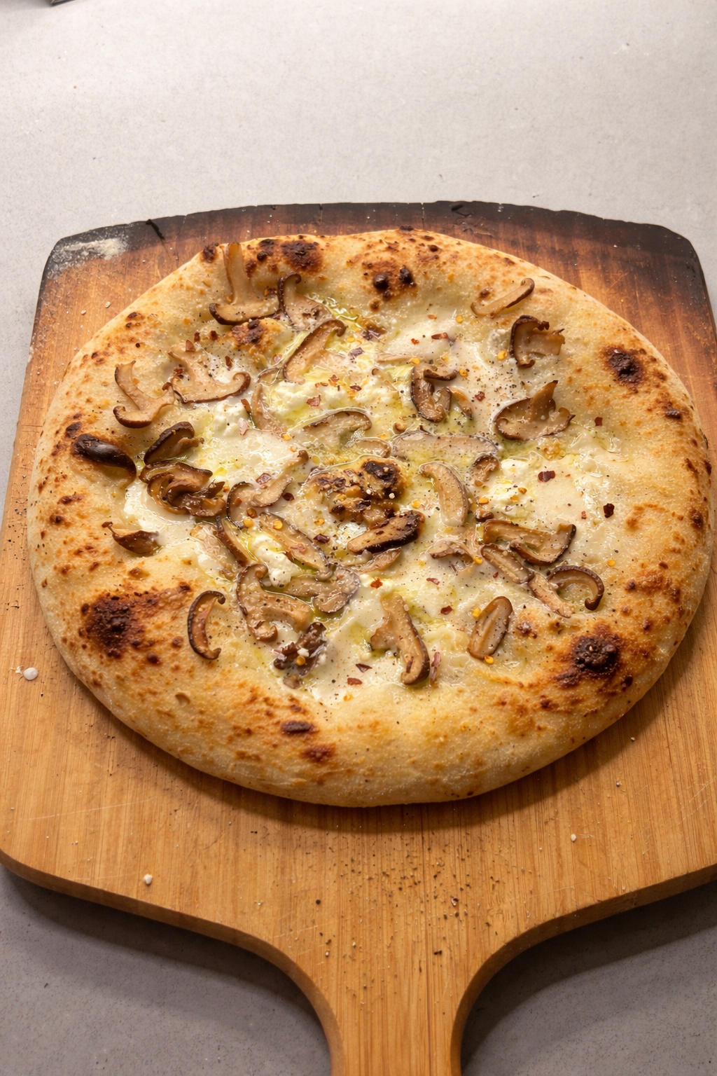 Mushroom and truffle pizza served from Soci Pizza truck catering in Raleigh-Durham, NC, with Haw River mushrooms and truffle oil.
