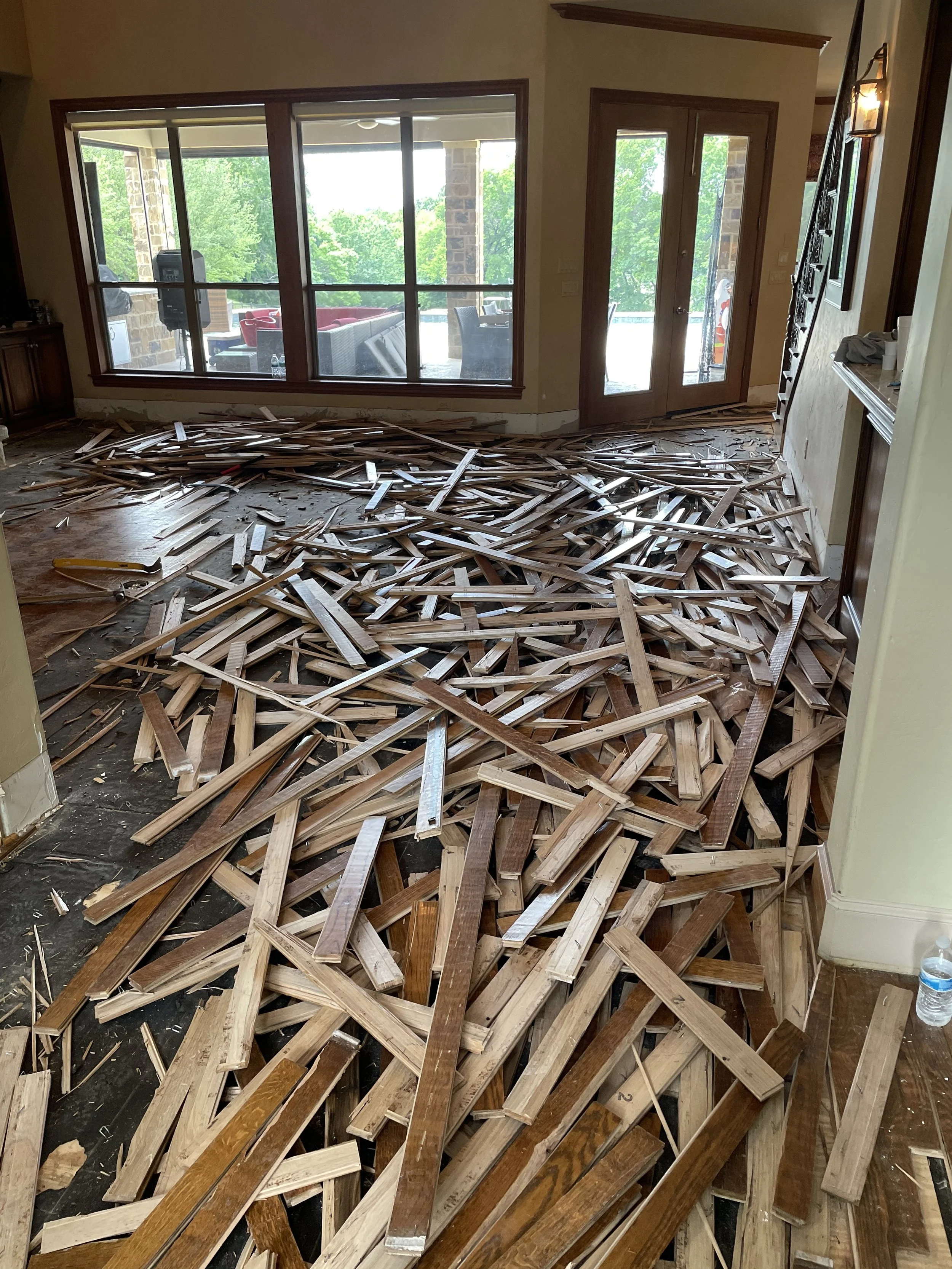 den wood floors torn up.jpeg