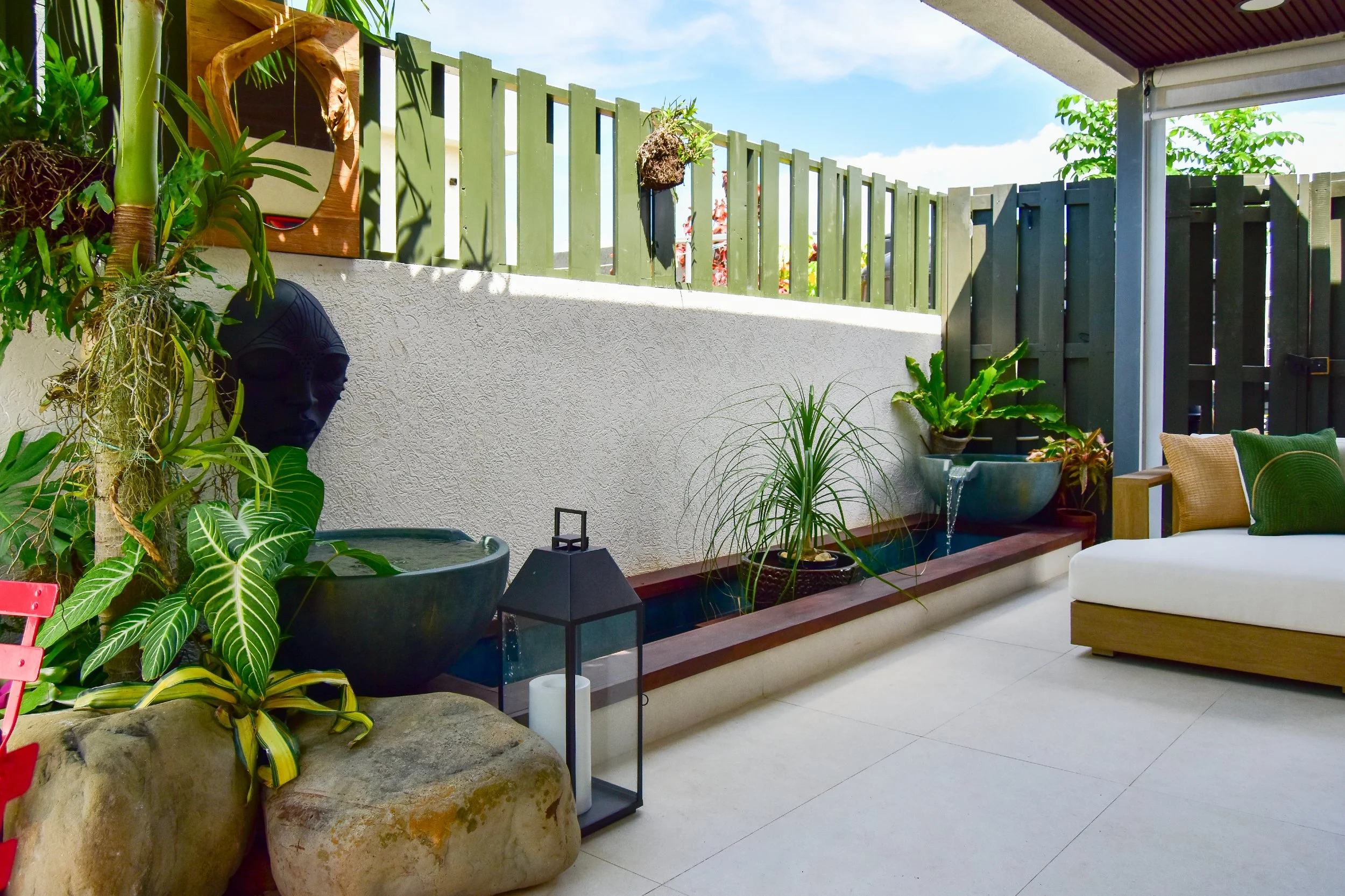 modern-outdoor-patio-with-koi-pond-and-tropical-plants-ocho-rios-jamaica.jpg