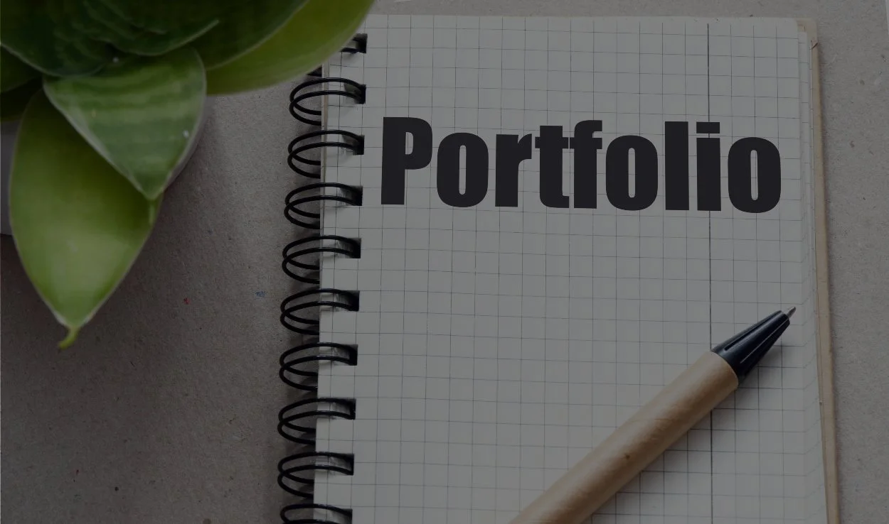 The word portfolio in an office notebook.