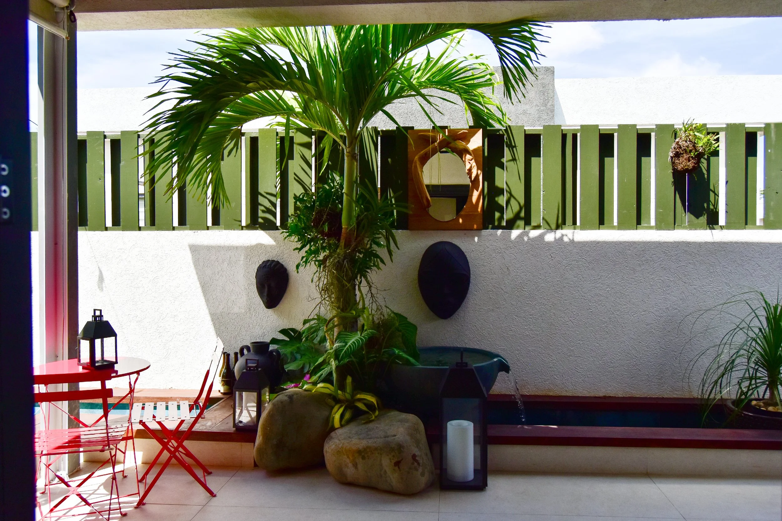 modern-small-patio-with-palm-and-water-feature-ocho-rios-jamaica.jpg