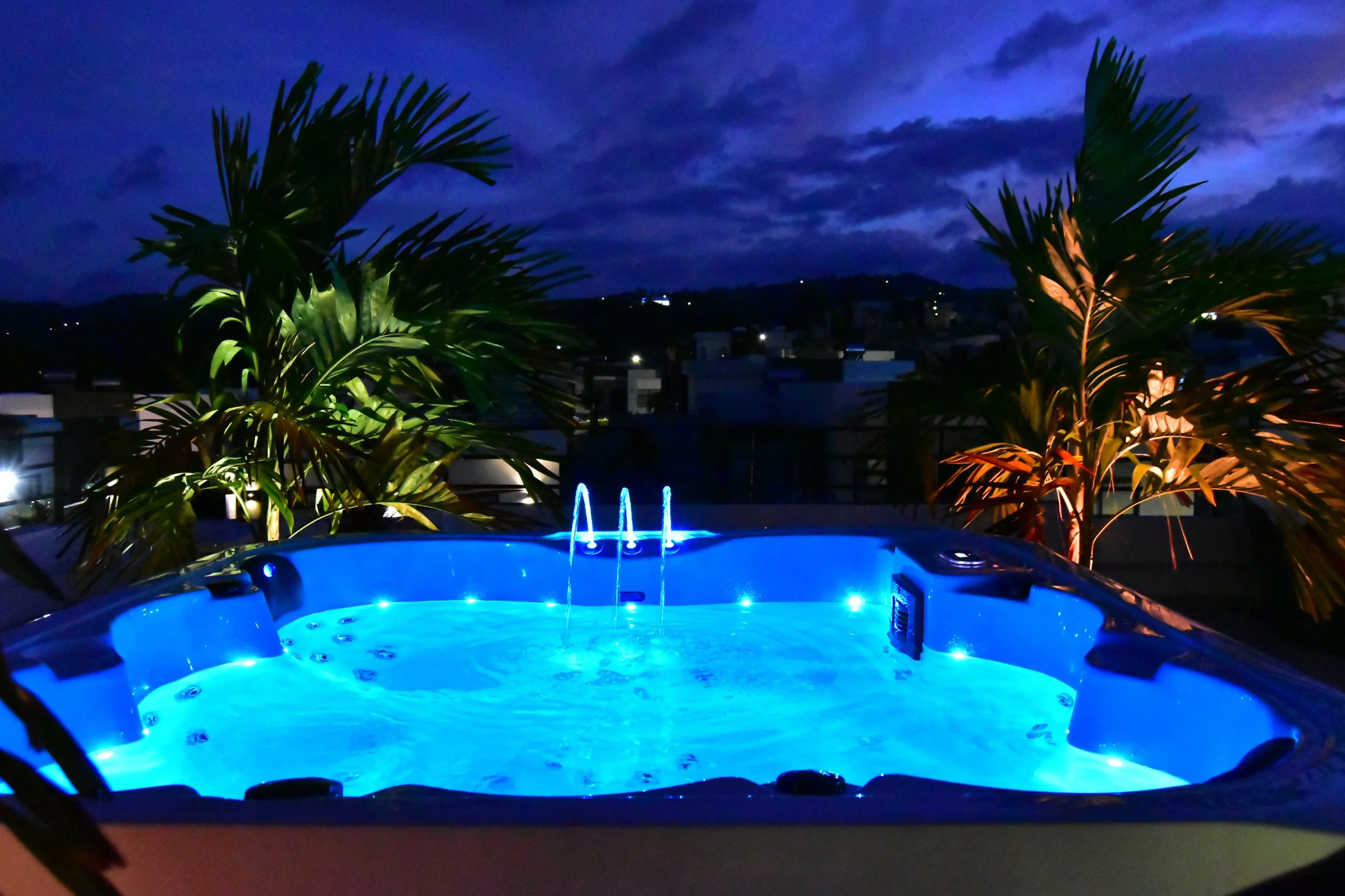 modern-rooftop-jacuzzi-night-landscape-lighting-design-blue-glow.jpg