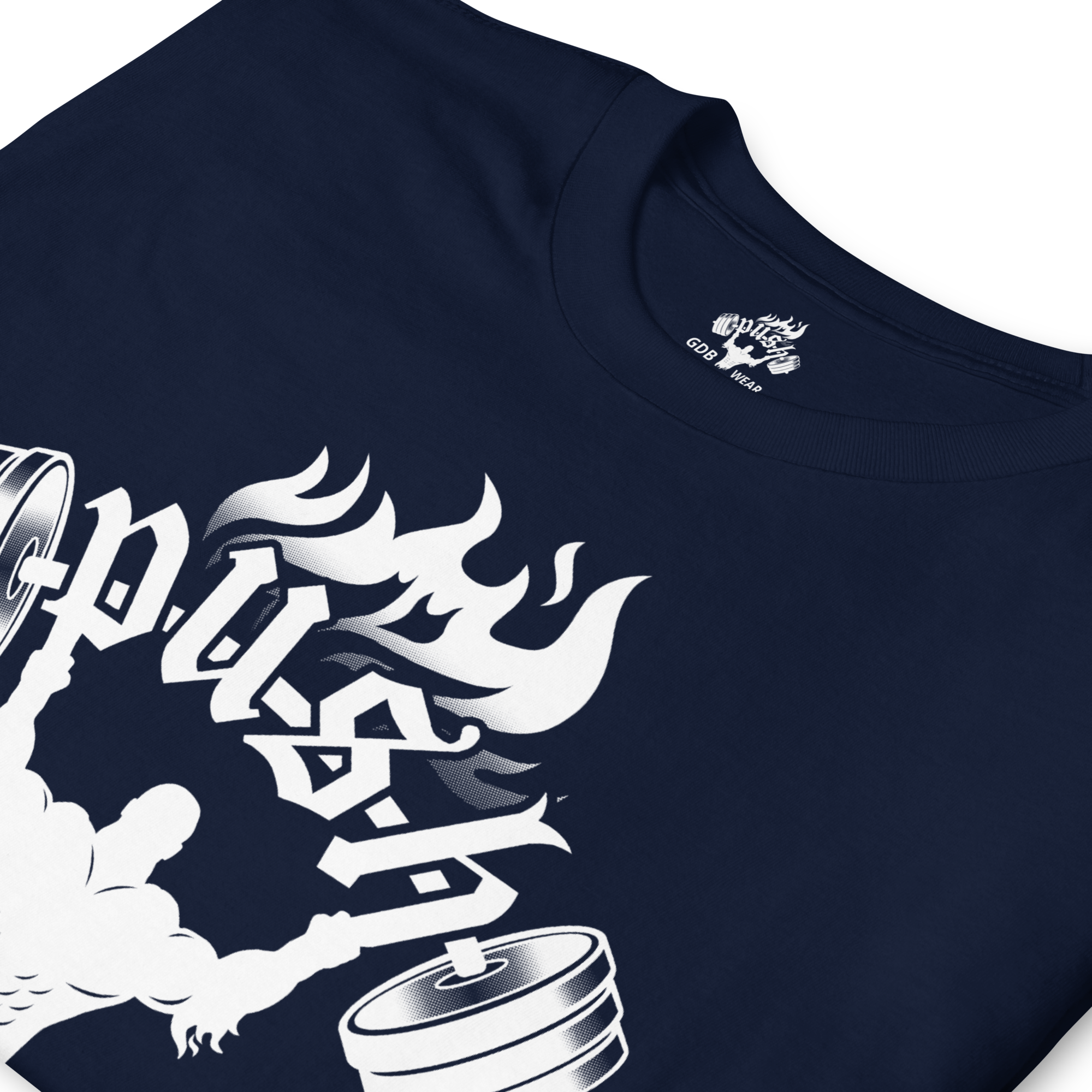 Close-up of a navy blue t-shirt with a white graphic design featuring a man holding word push with weights on end , flames above push, and stylized text.
