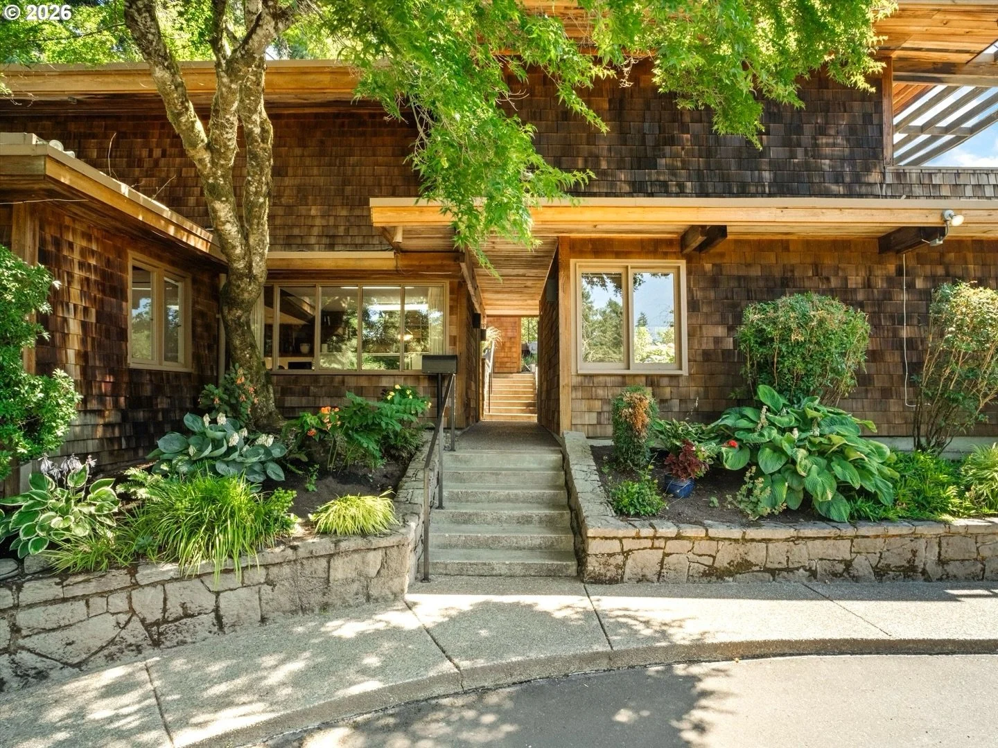 This week in Danny&rsquo;s Digest: A 1964 William Church post-and-beam original in the West Hills, full of cedar paneling, exposed beams, that classic Northwest modern character, with a flexible lower-level ADU and decks off the main living spaces th