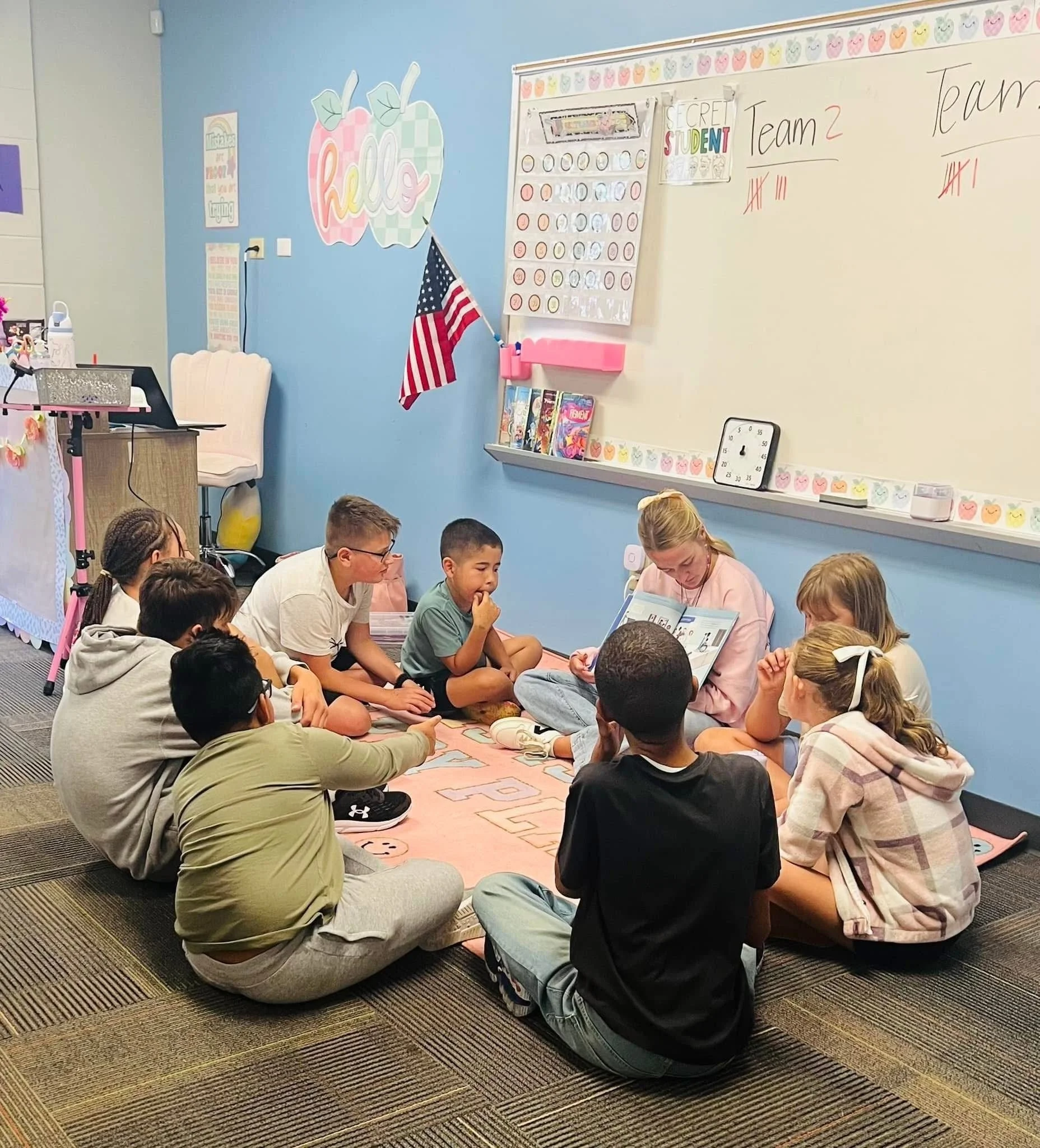 Teacher reading with student
